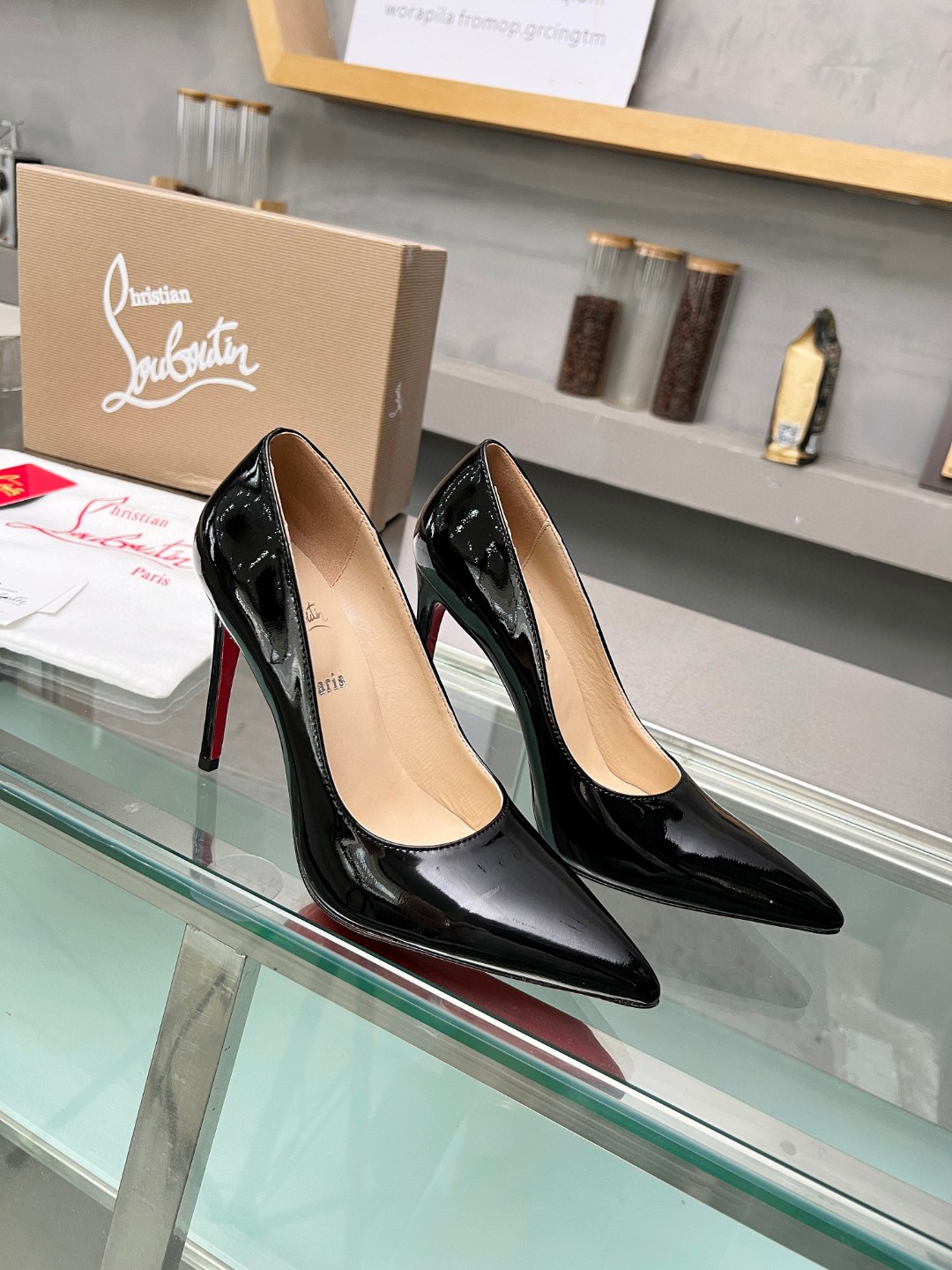 Christian Louboutin So Kate patent pumps
