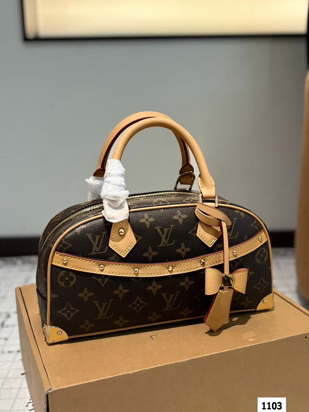LV multi-colored pillow bag