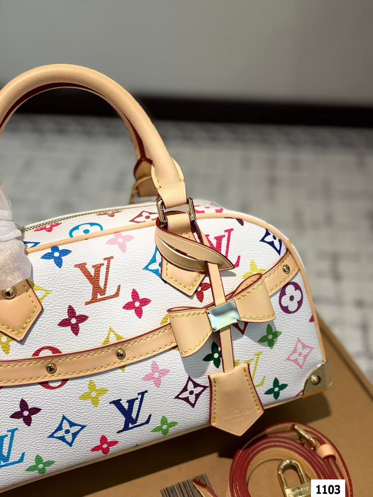 LV multi-colored pillow bag