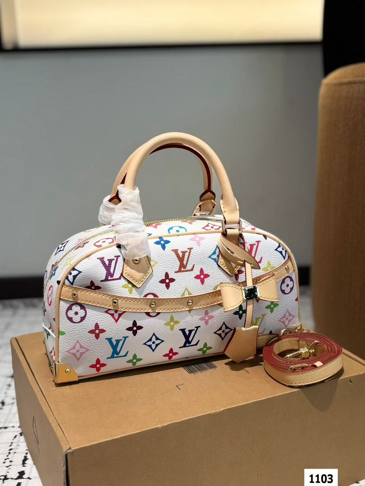 LV multi-colored pillow bag