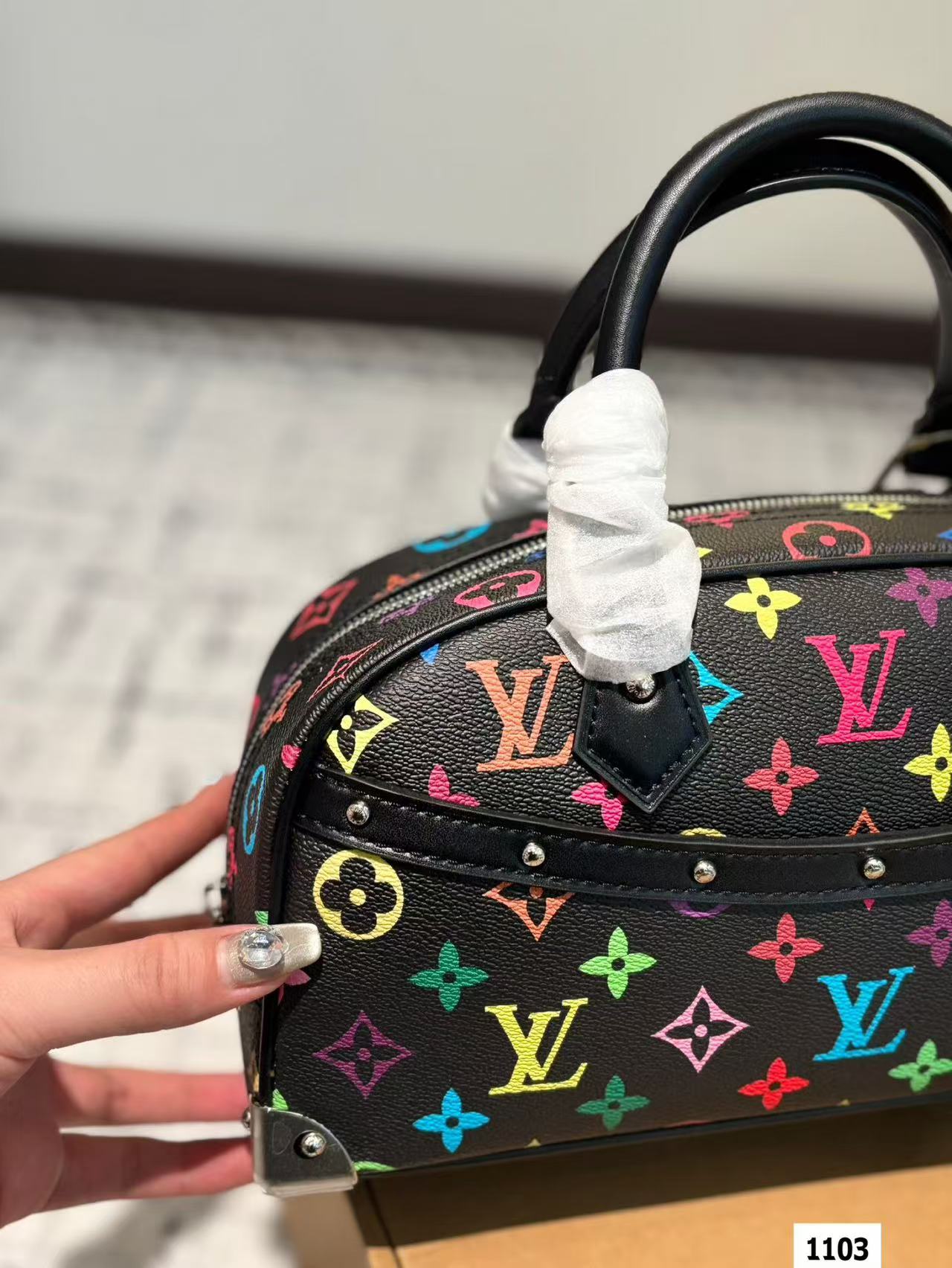 LV multi-colored pillow bag