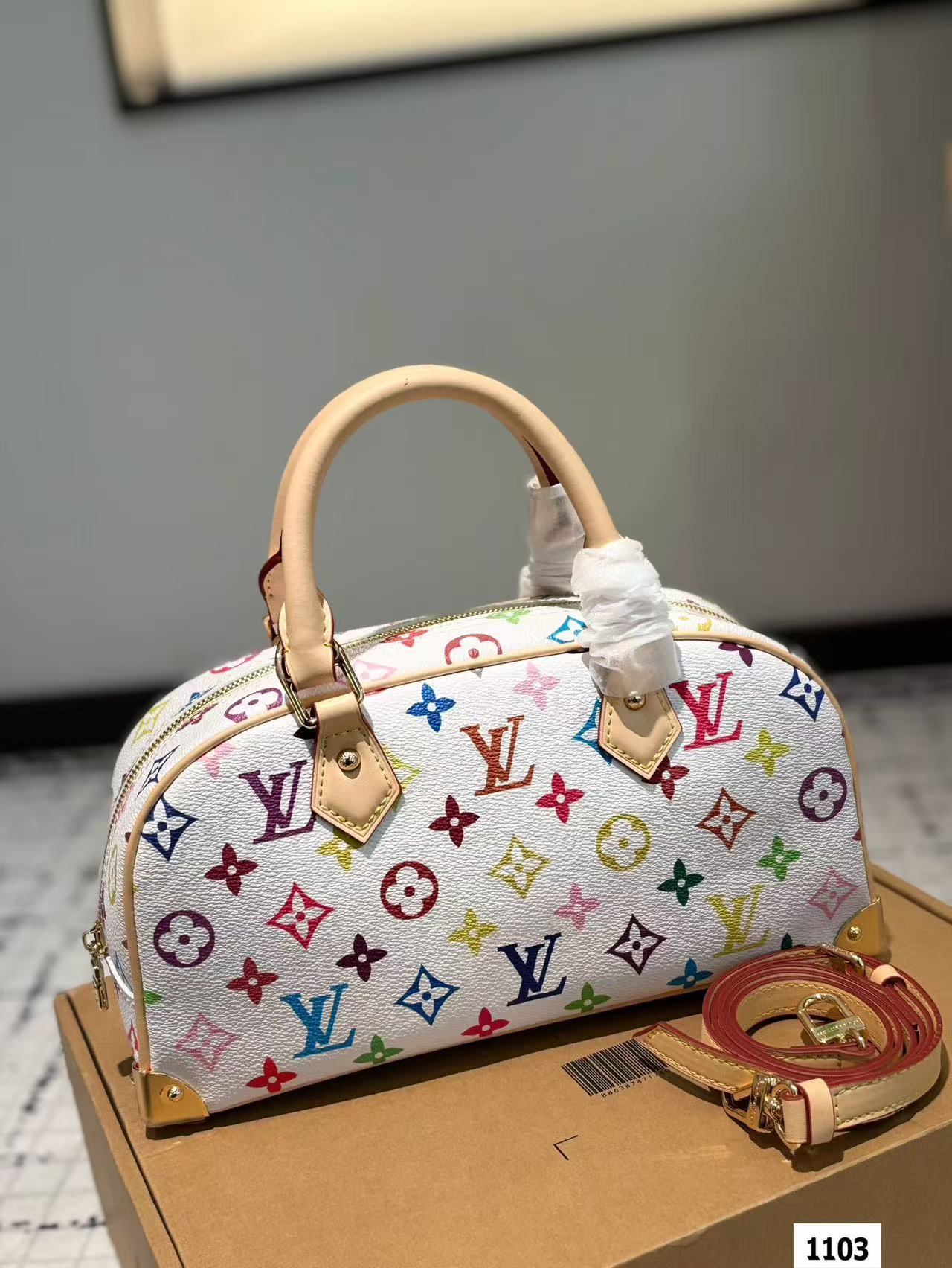 LV multi-colored pillow bag
