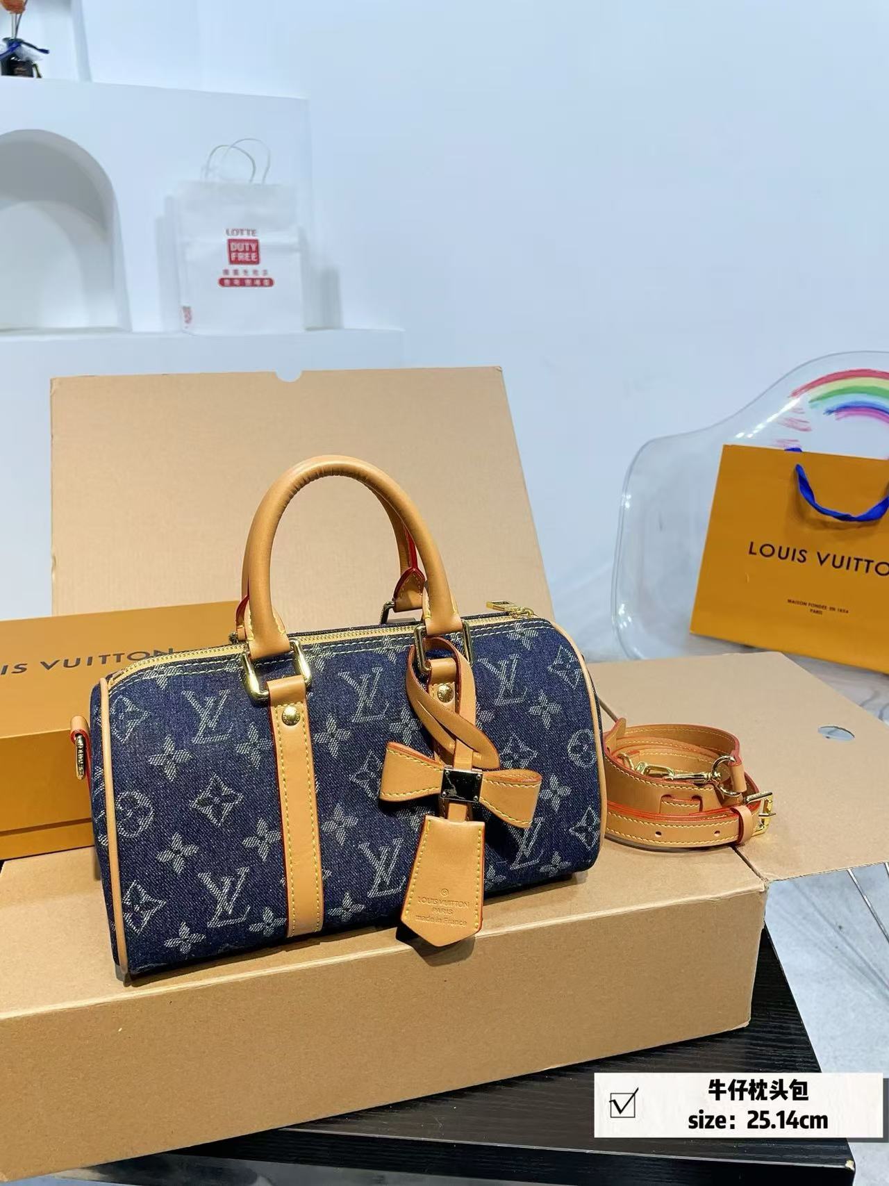 Louis Vuitton denim pillow bag