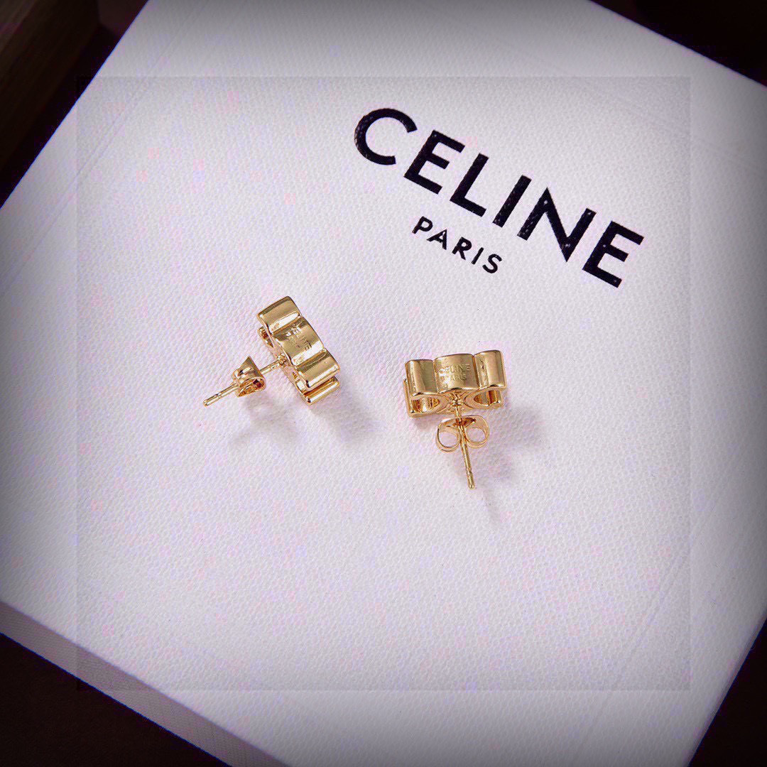 Celine's new golden arc de Triomphe stud earrings