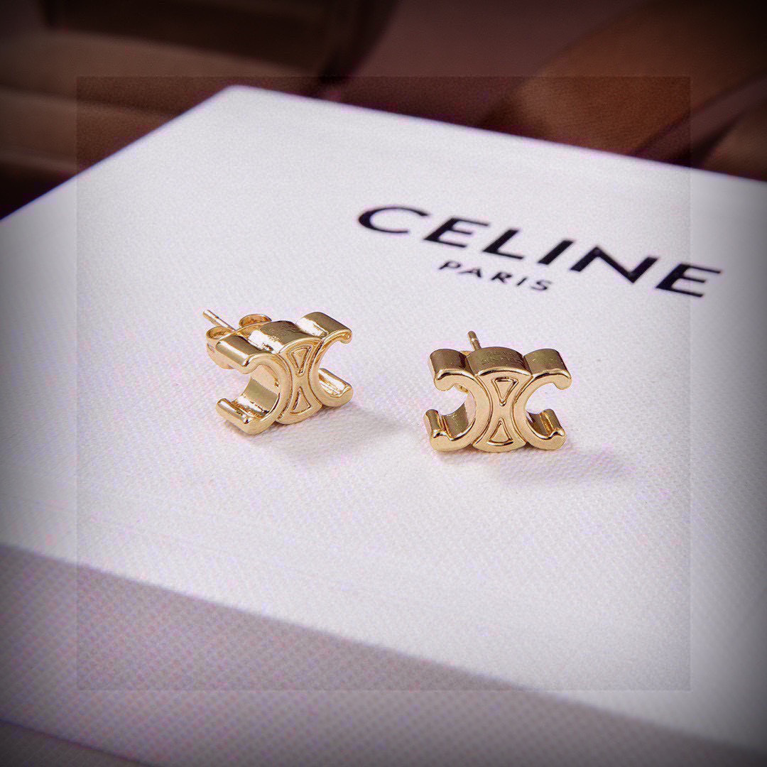 Celine's new golden arc de Triomphe stud earrings