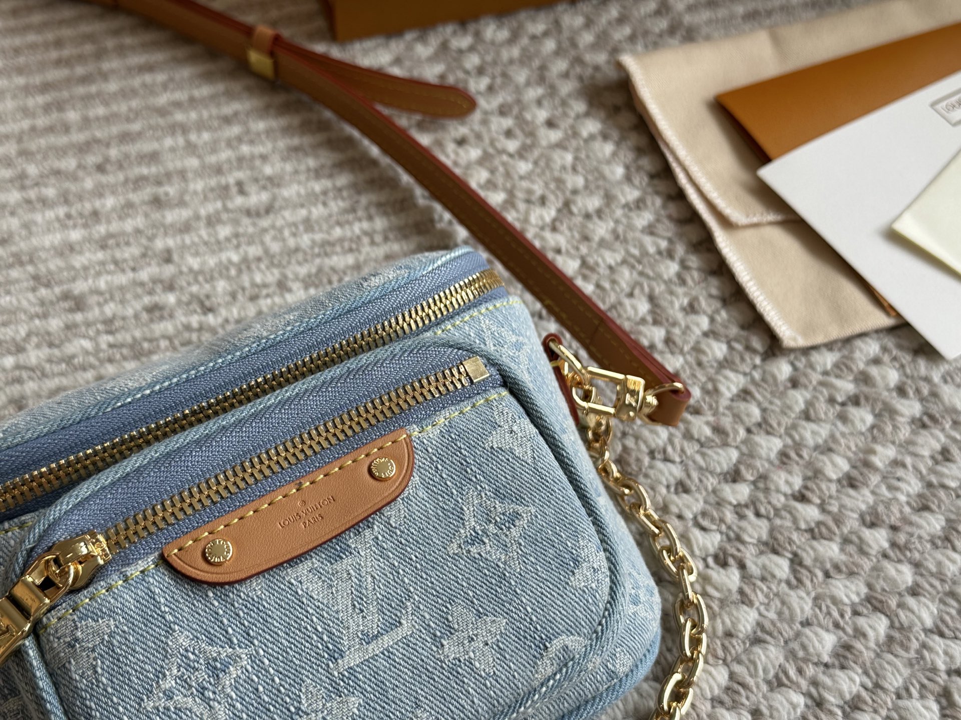 LV light-colored denim mini waist bag