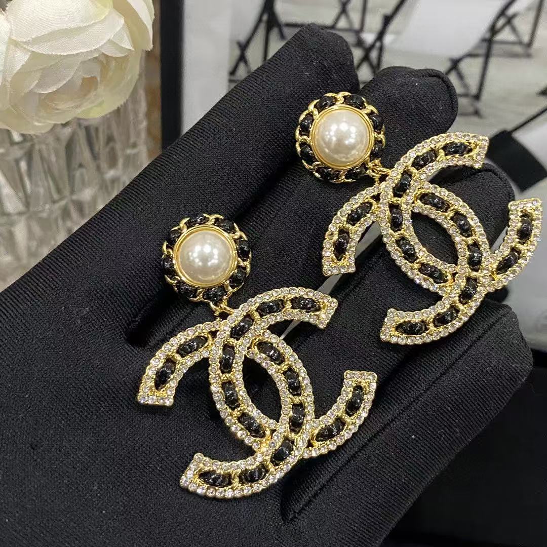 Chanel letter pearl stud earrings