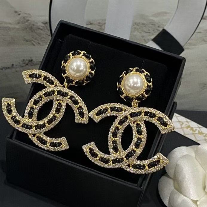Chanel letter pearl stud earrings