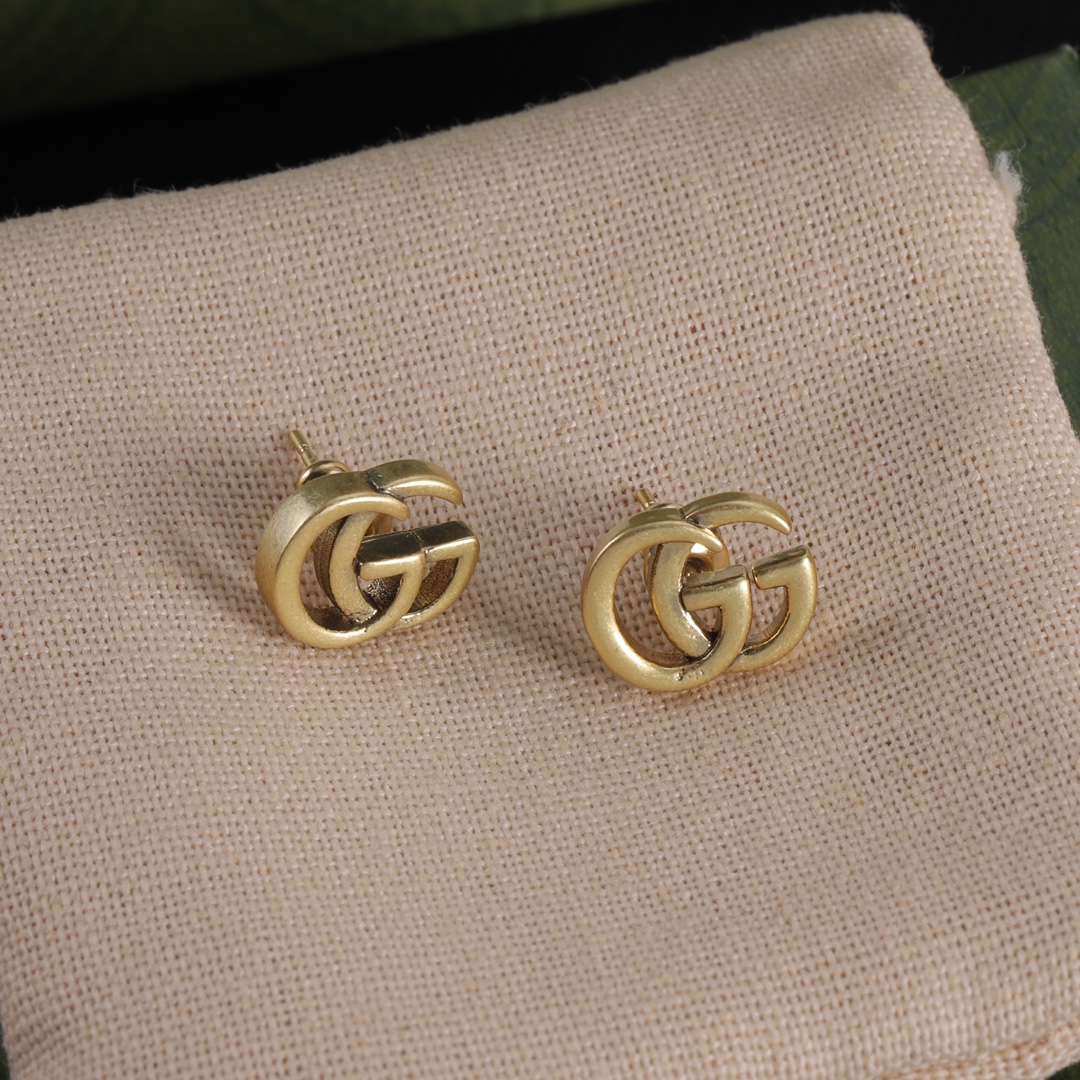 Gucci logo stud earrings