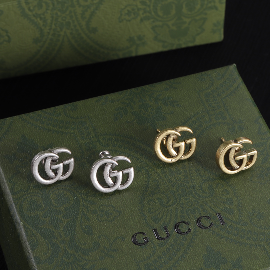 Gucci logo stud earrings