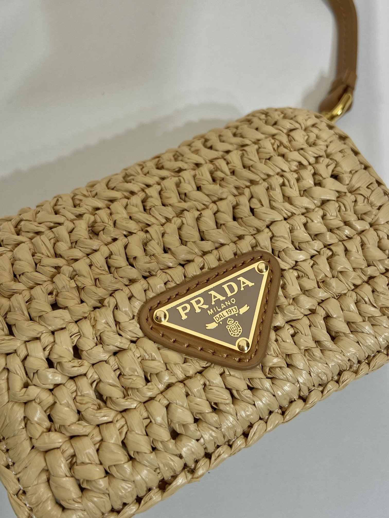 Prada Hand-woven, imported cowhide bag