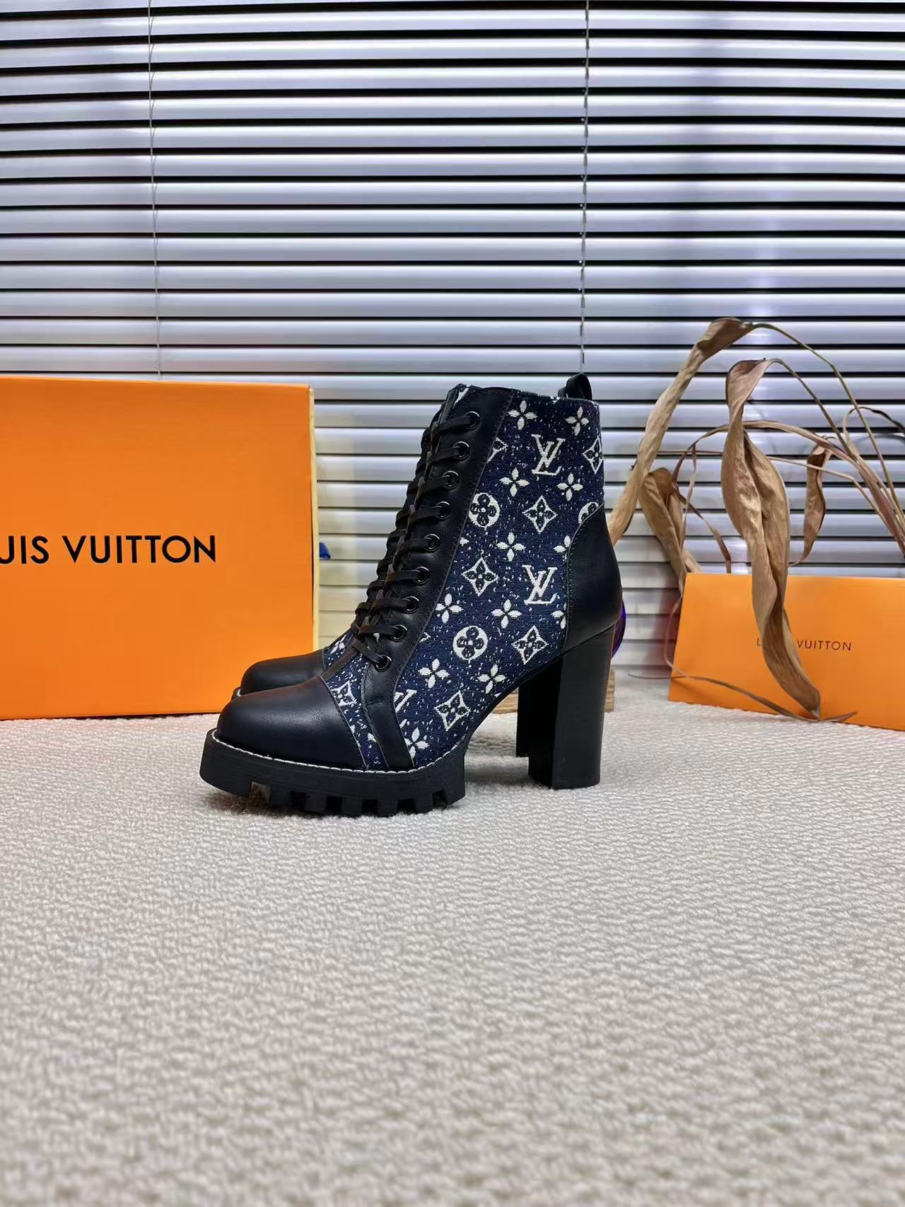 LV boots and high heels