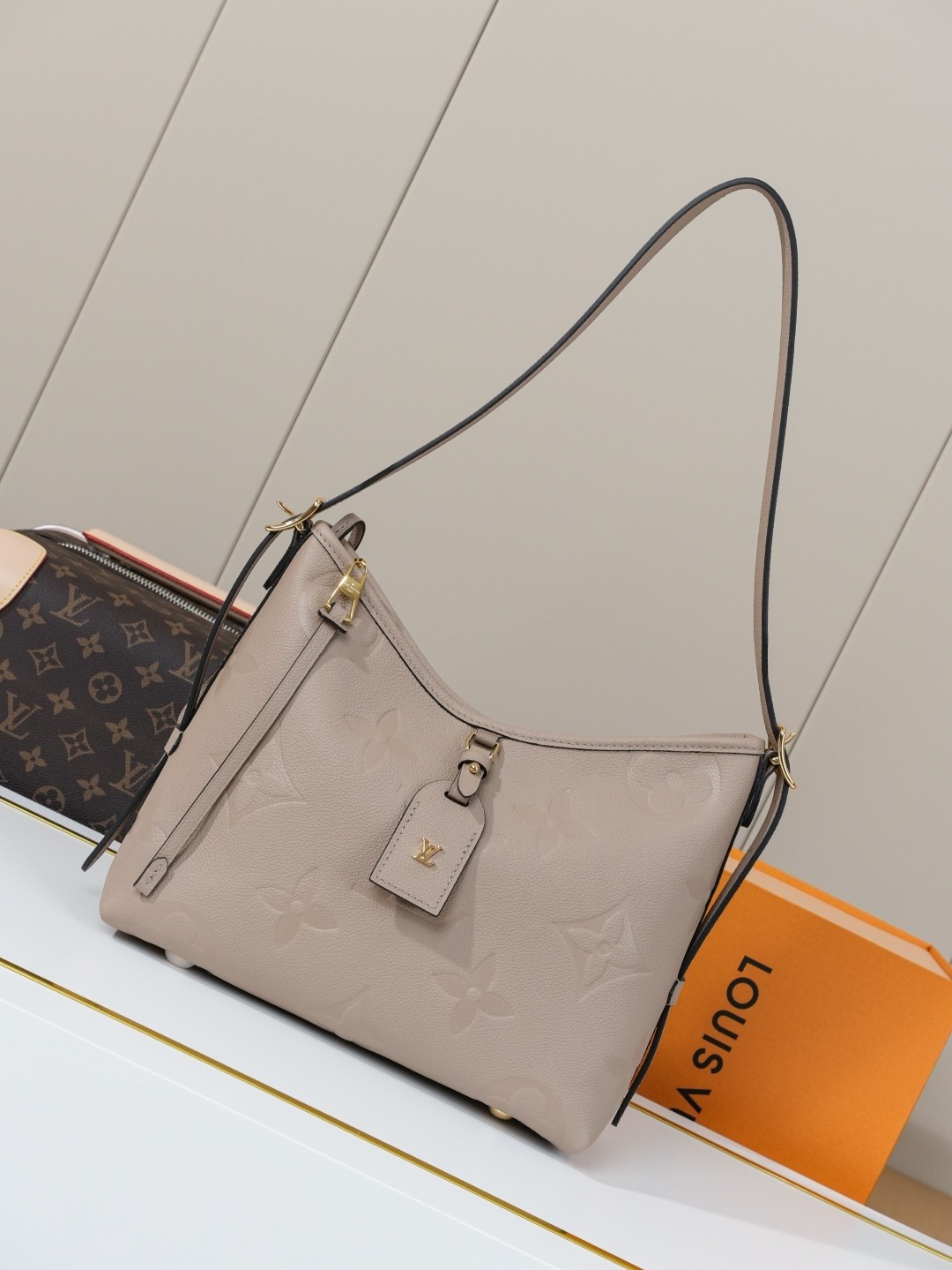 LV CarryAll Monogram Emeinte Milky Way handbag