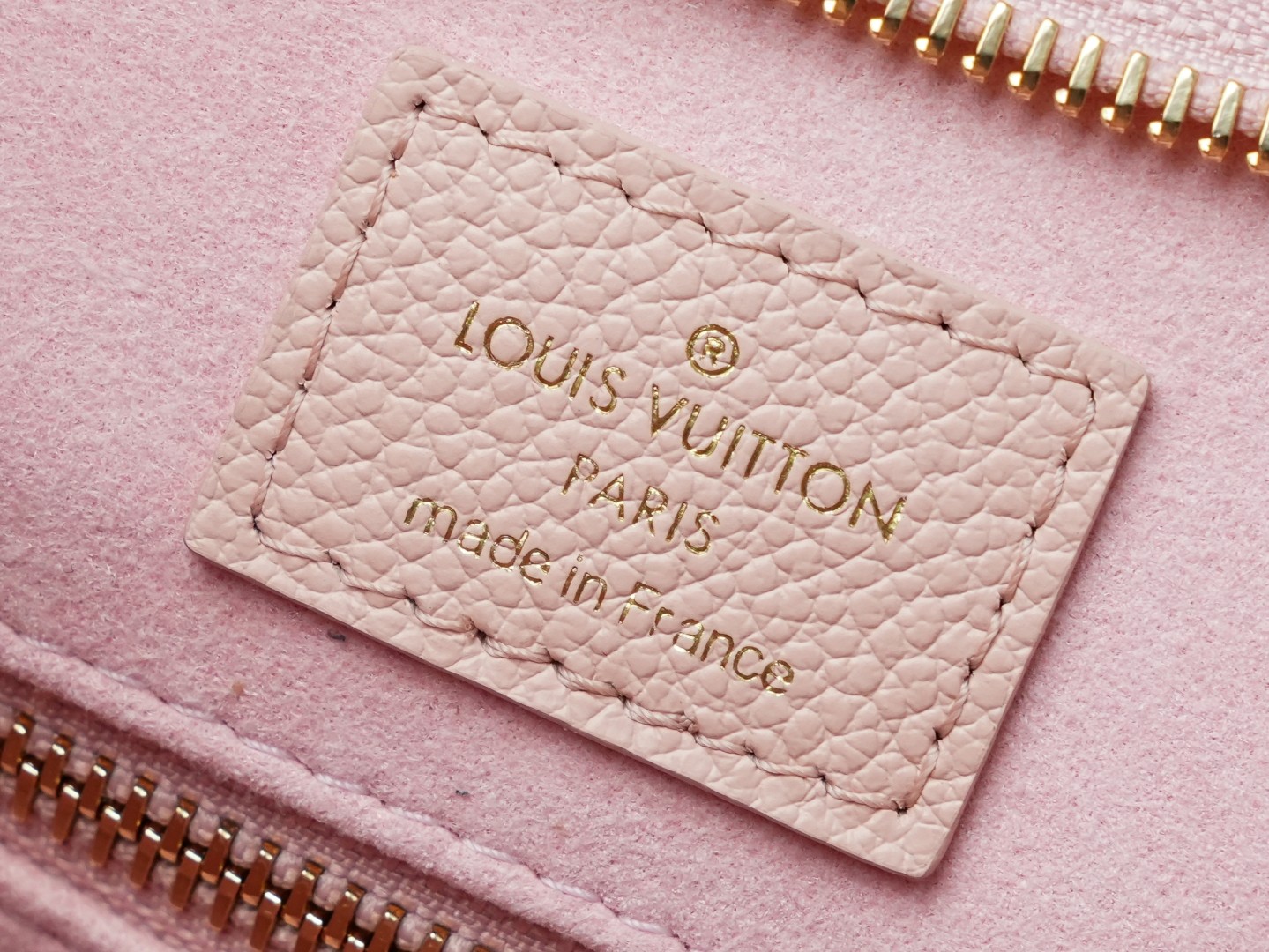 LV CarryAll Monogram Emeinte Milky Way handbag