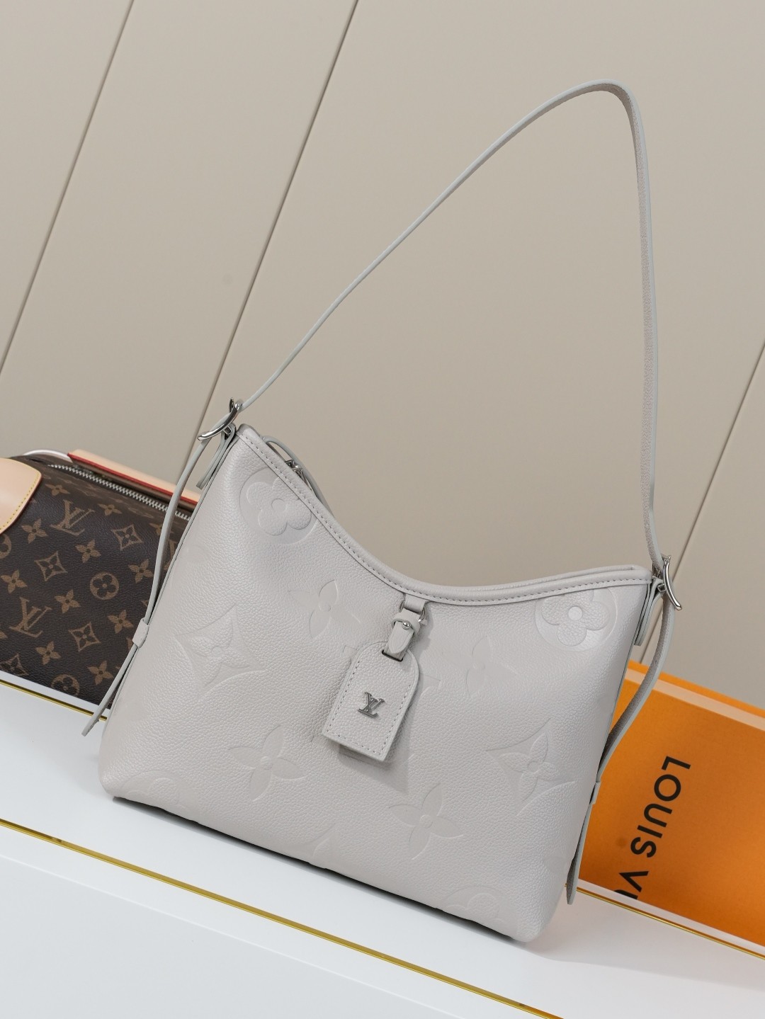 LV CarryAll Monogram Emeinte Milky Way handbag