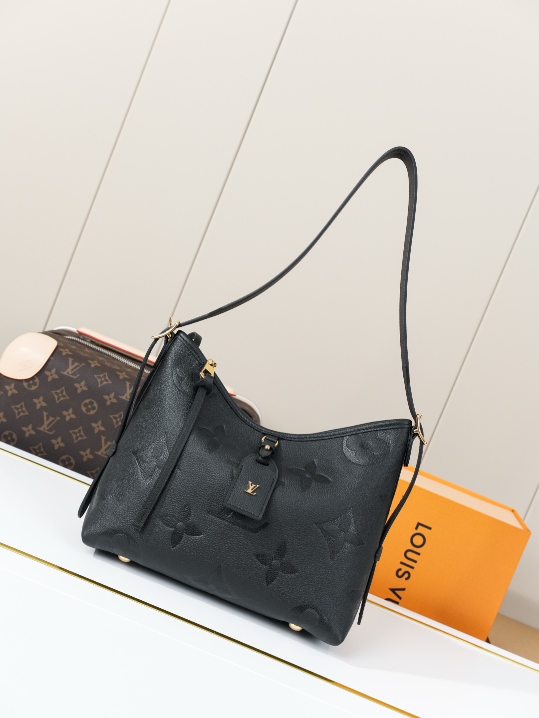 LV CarryAll Monogram Emeinte Milky Way handbag