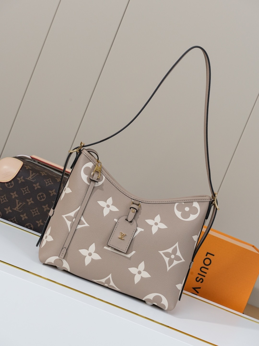 LV CarryAll Monogram Emeinte Milky Way handbag
