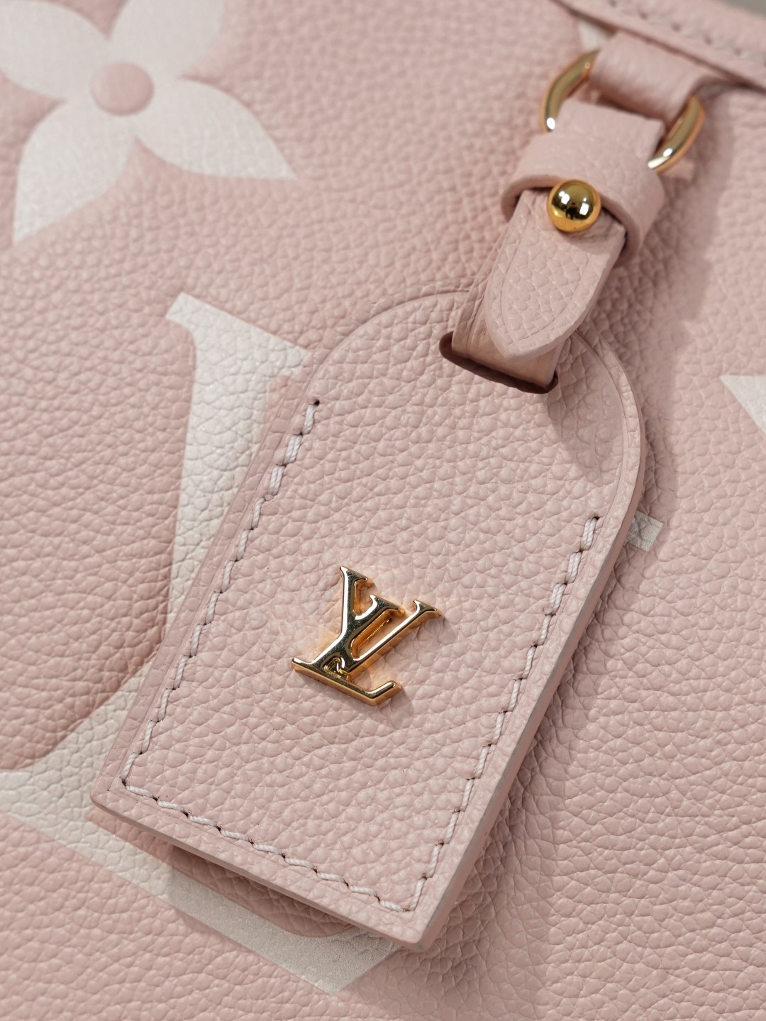 LV CarryAll Monogram Emeinte Milky Way handbag