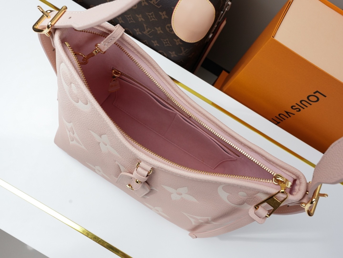 LV CarryAll Monogram Emeinte Milky Way handbag