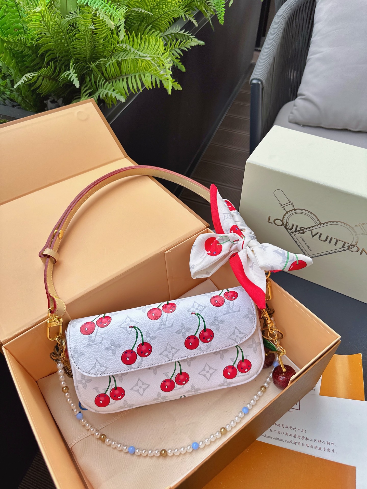 LV ivy woc cherry bag