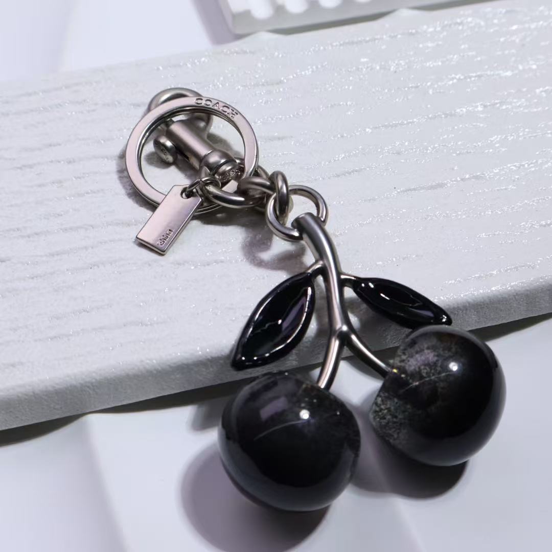 Coach cherry keychain
