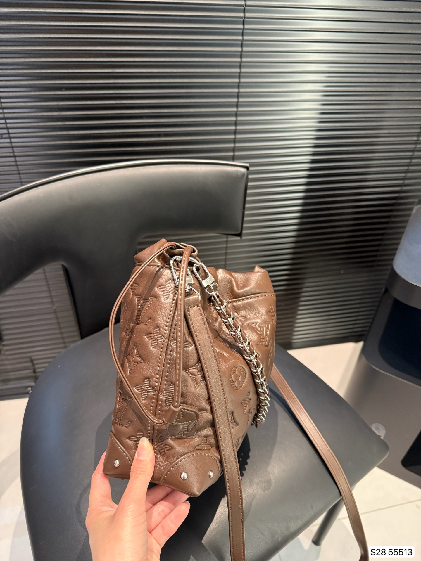 LV embossed bucket bag
