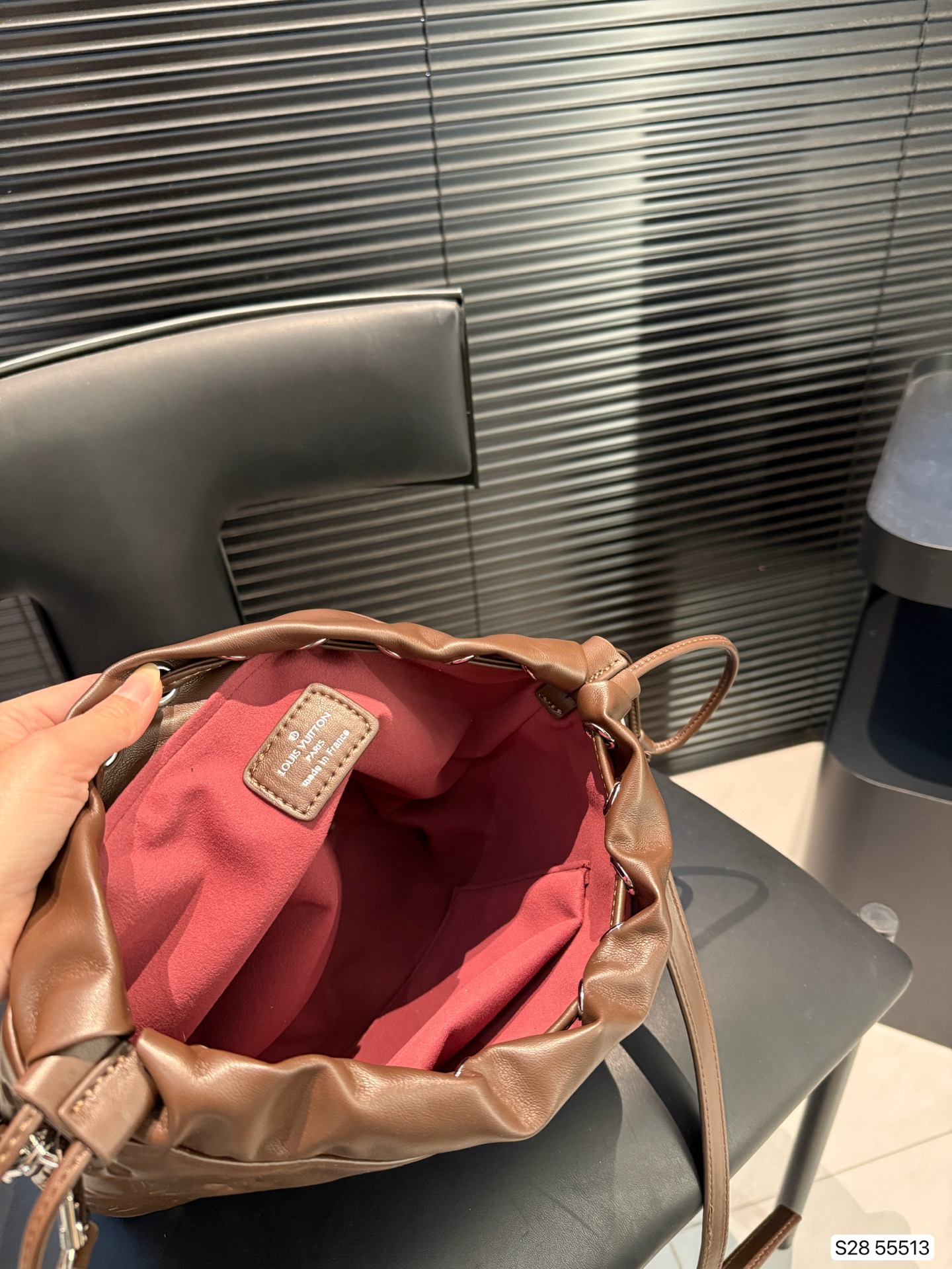 LV embossed bucket bag