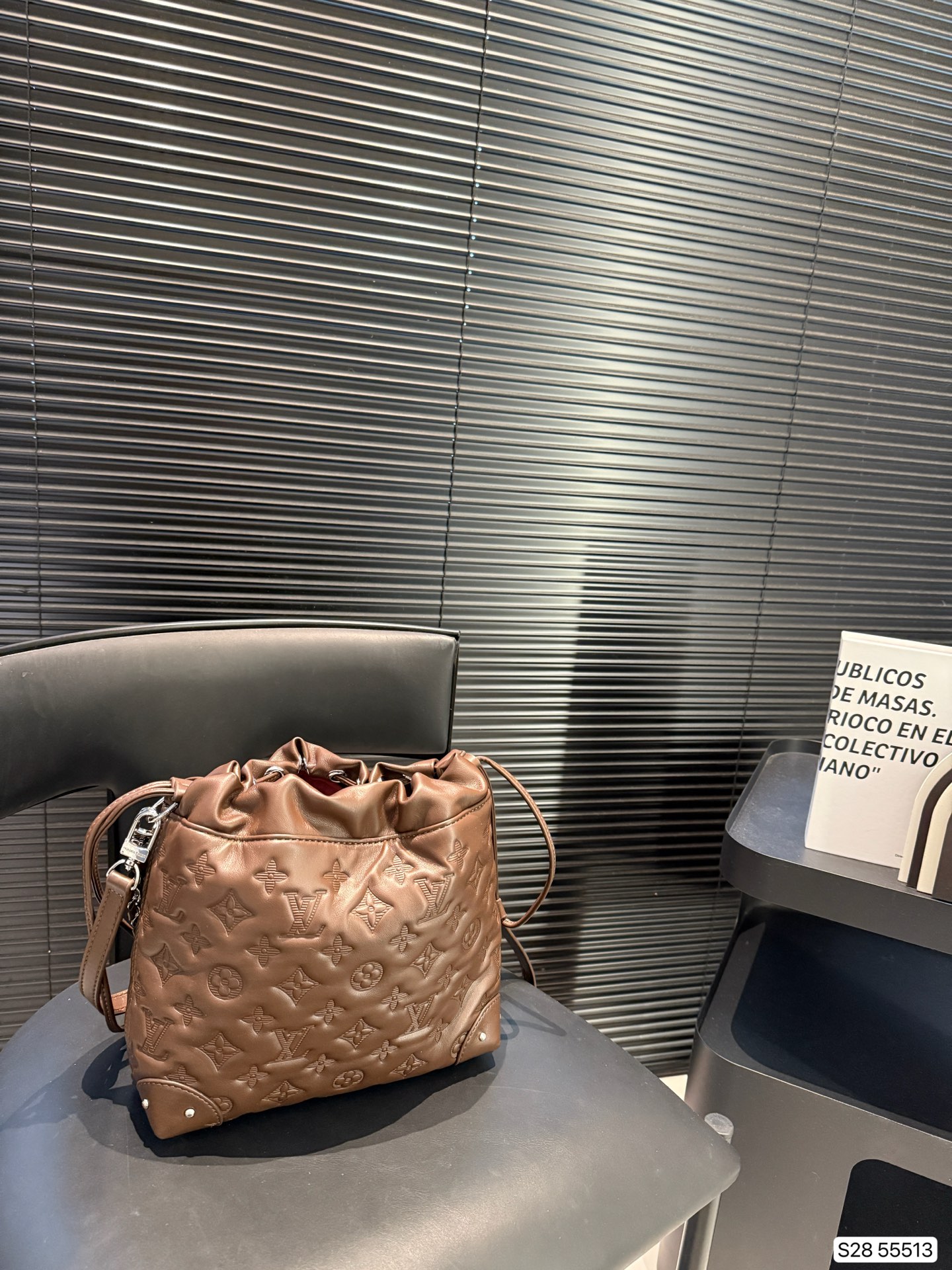 LV embossed bucket bag