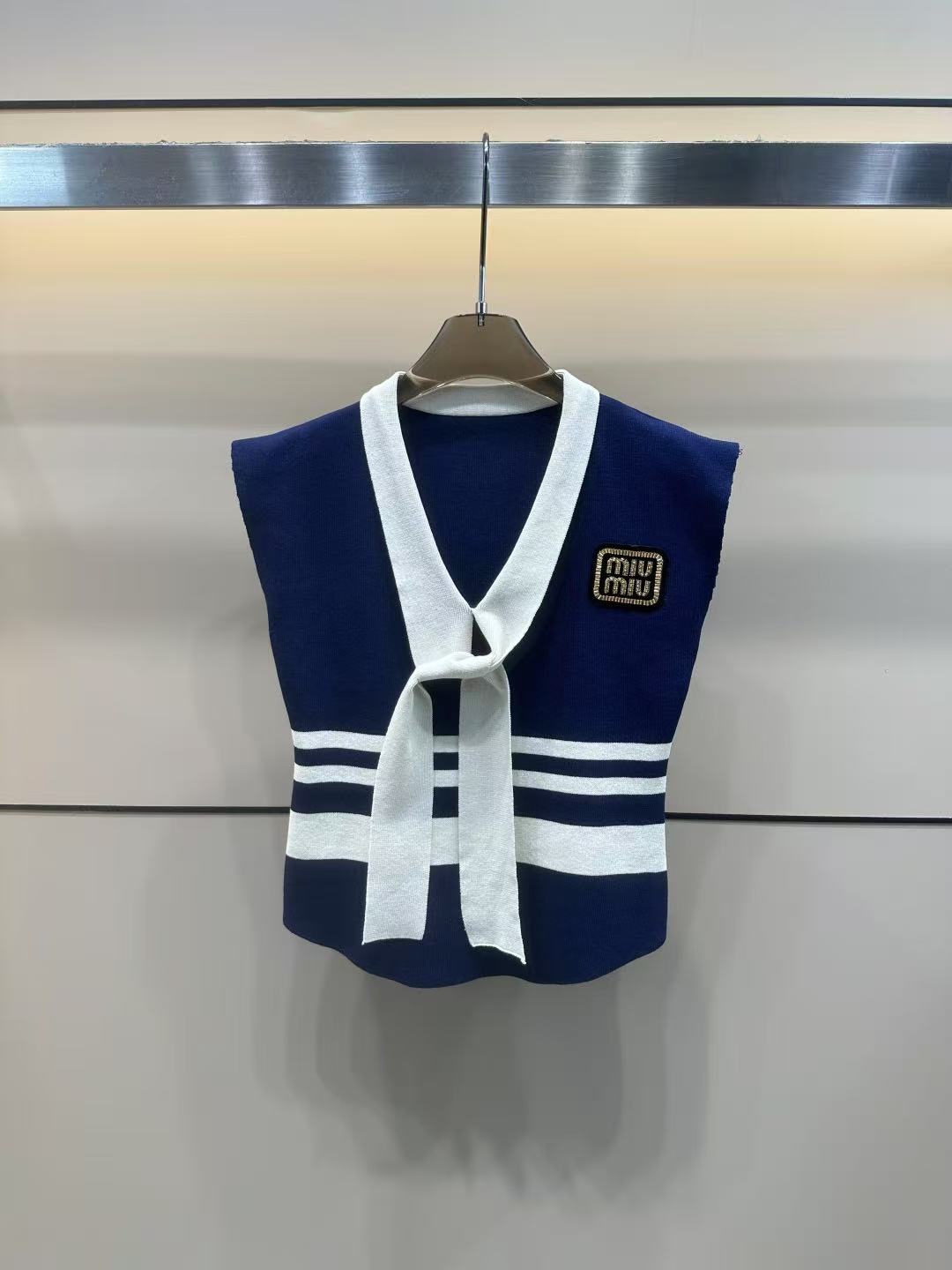 MIUMIU sleeveless T-shirt