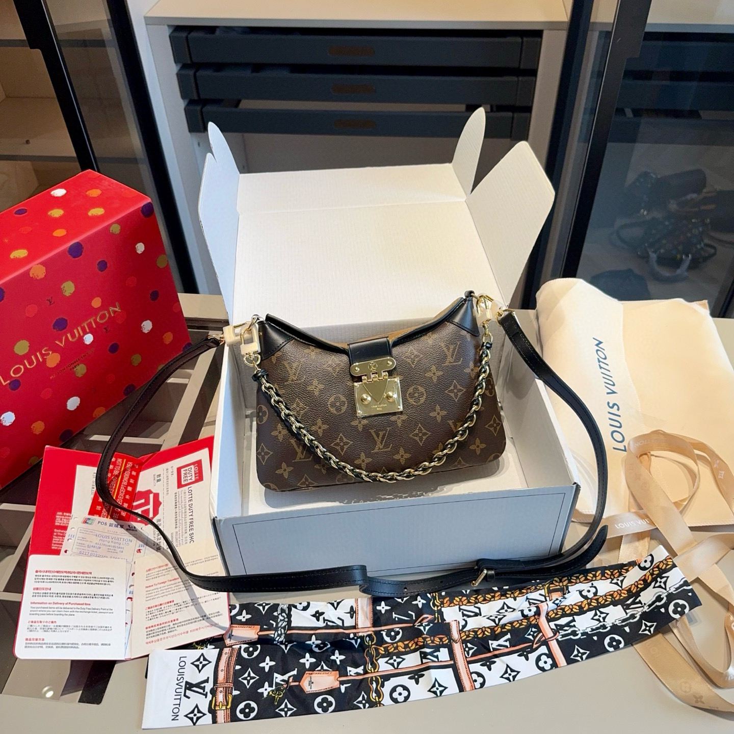 LV Twinny horn bag
