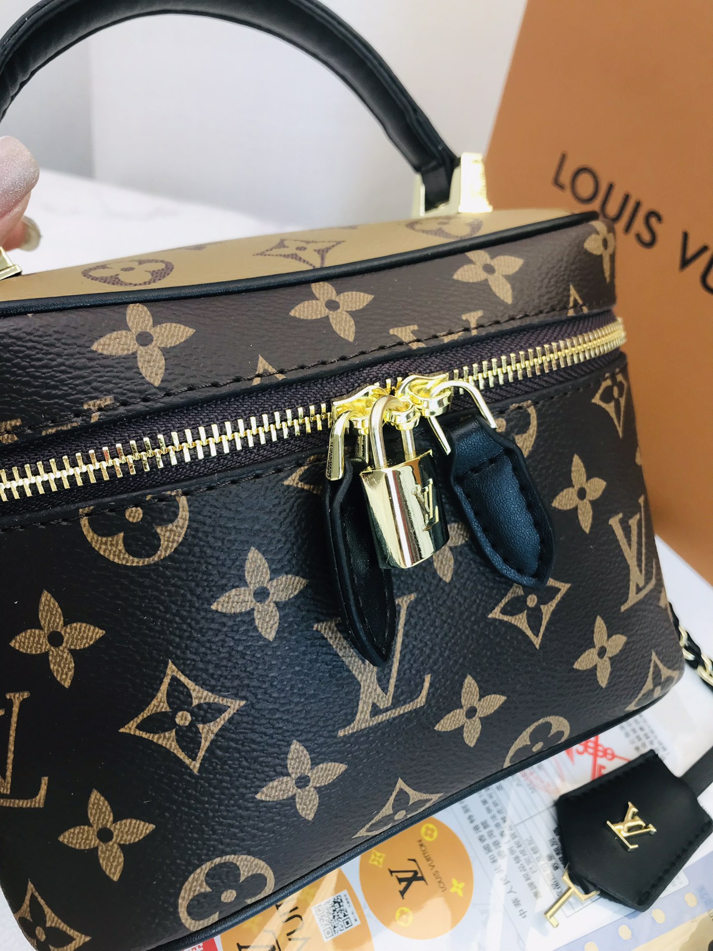 LV single-shoulder makeup bag
