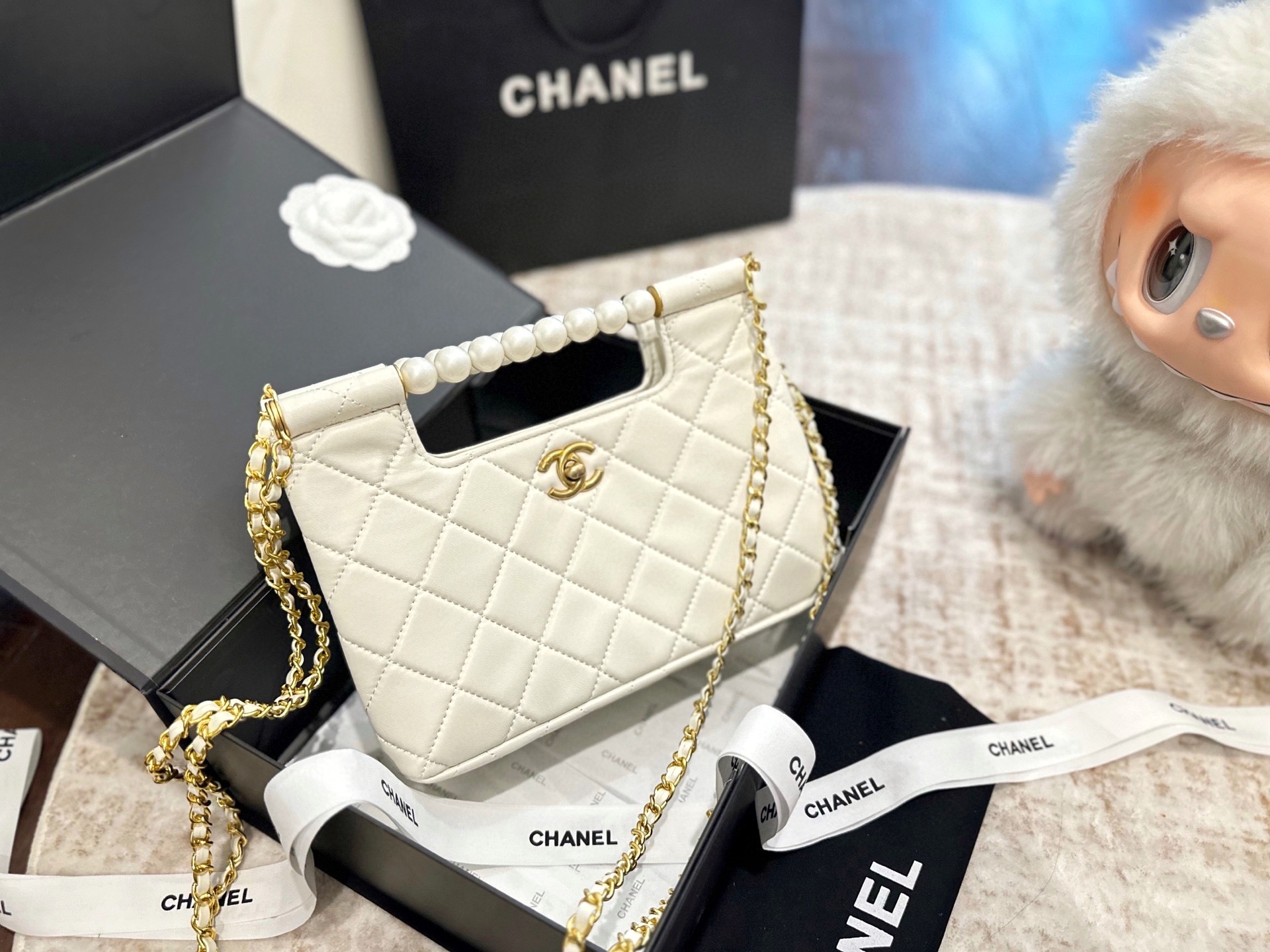 Chanel 25P pearl handle bag