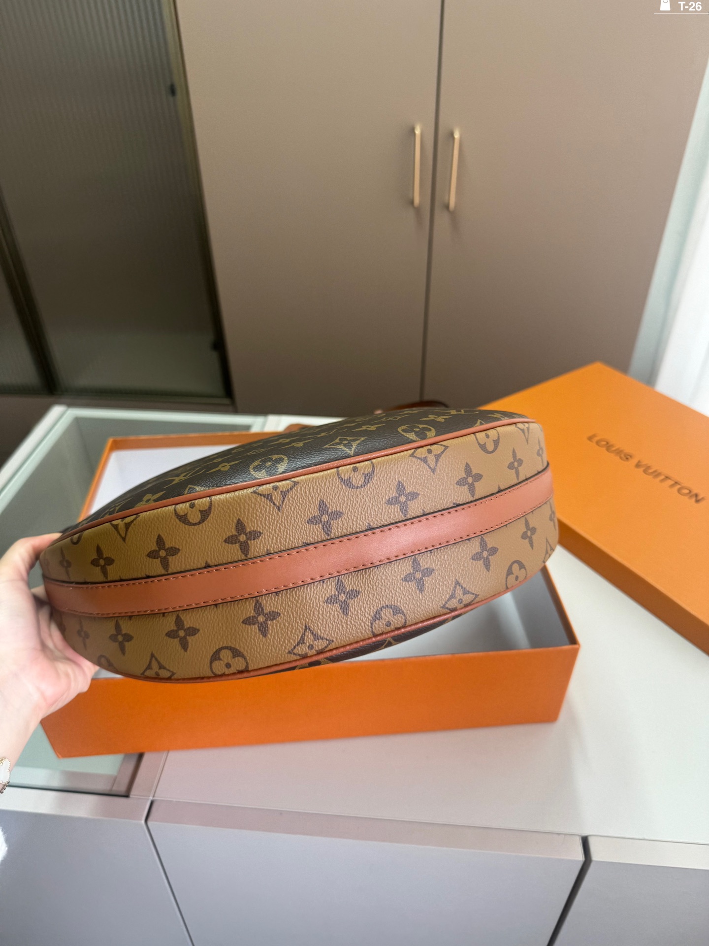 LV crescent-shaped bag chain strap shoulder bag