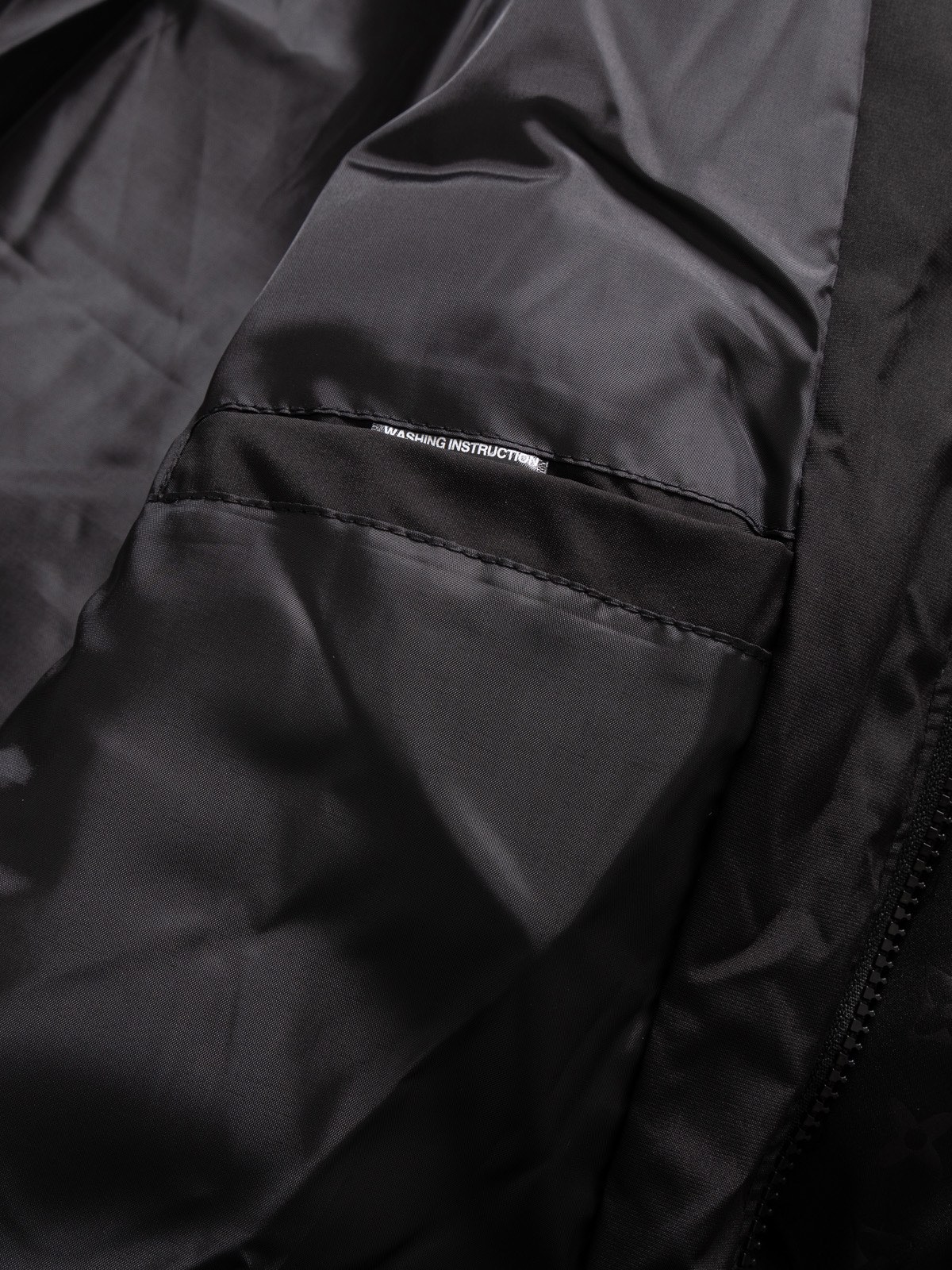 The North Face collaboration with Louis Vuitton (LV) in a cotton jacket.