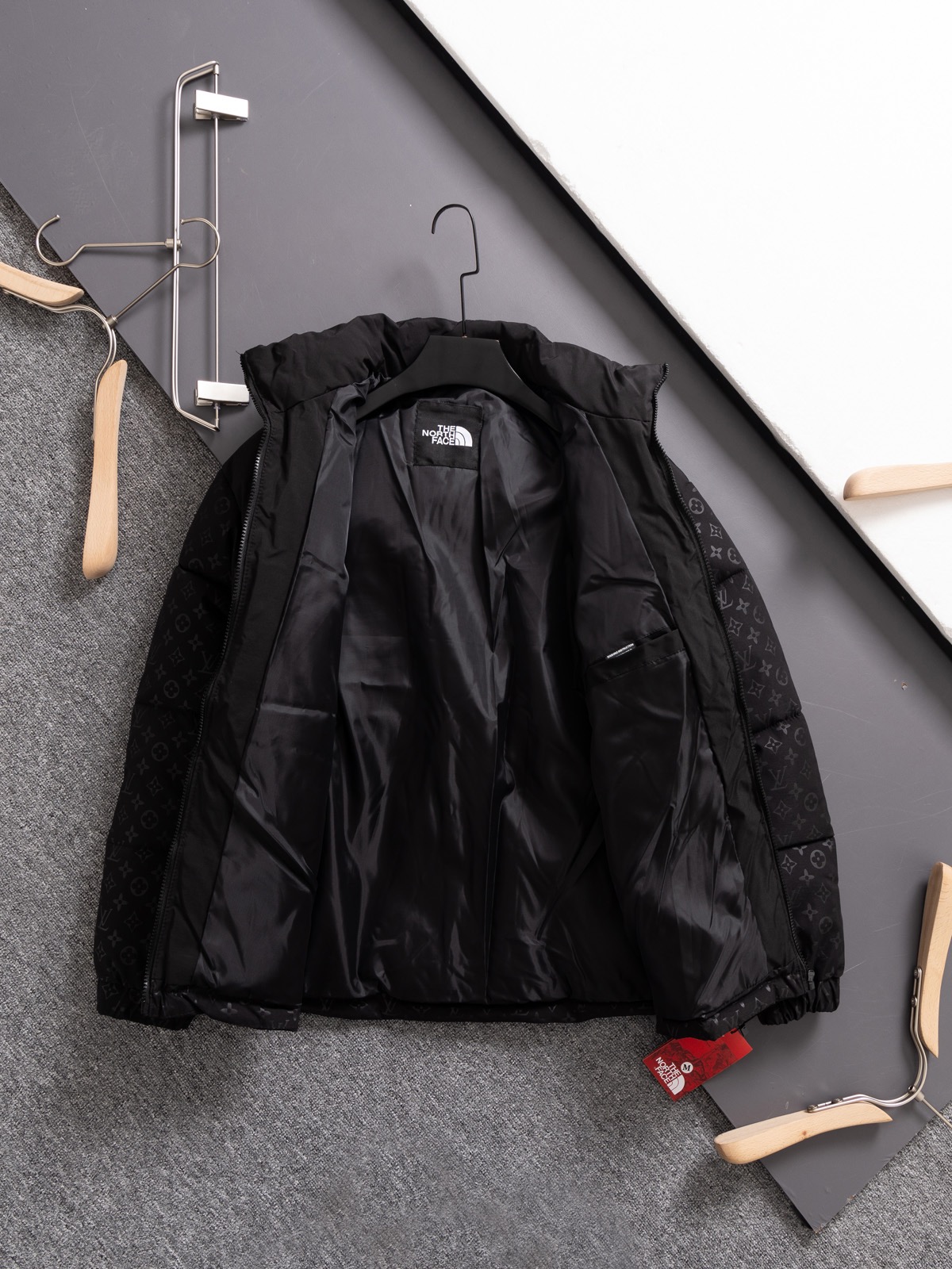 The North Face collaboration with Louis Vuitton (LV) in a cotton jacket.
