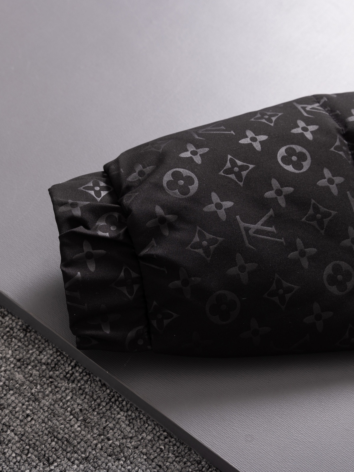 The North Face collaboration with Louis Vuitton (LV) in a cotton jacket.