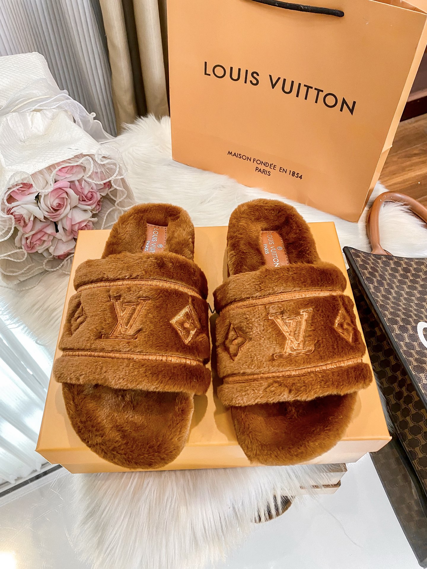 LV fur slippers