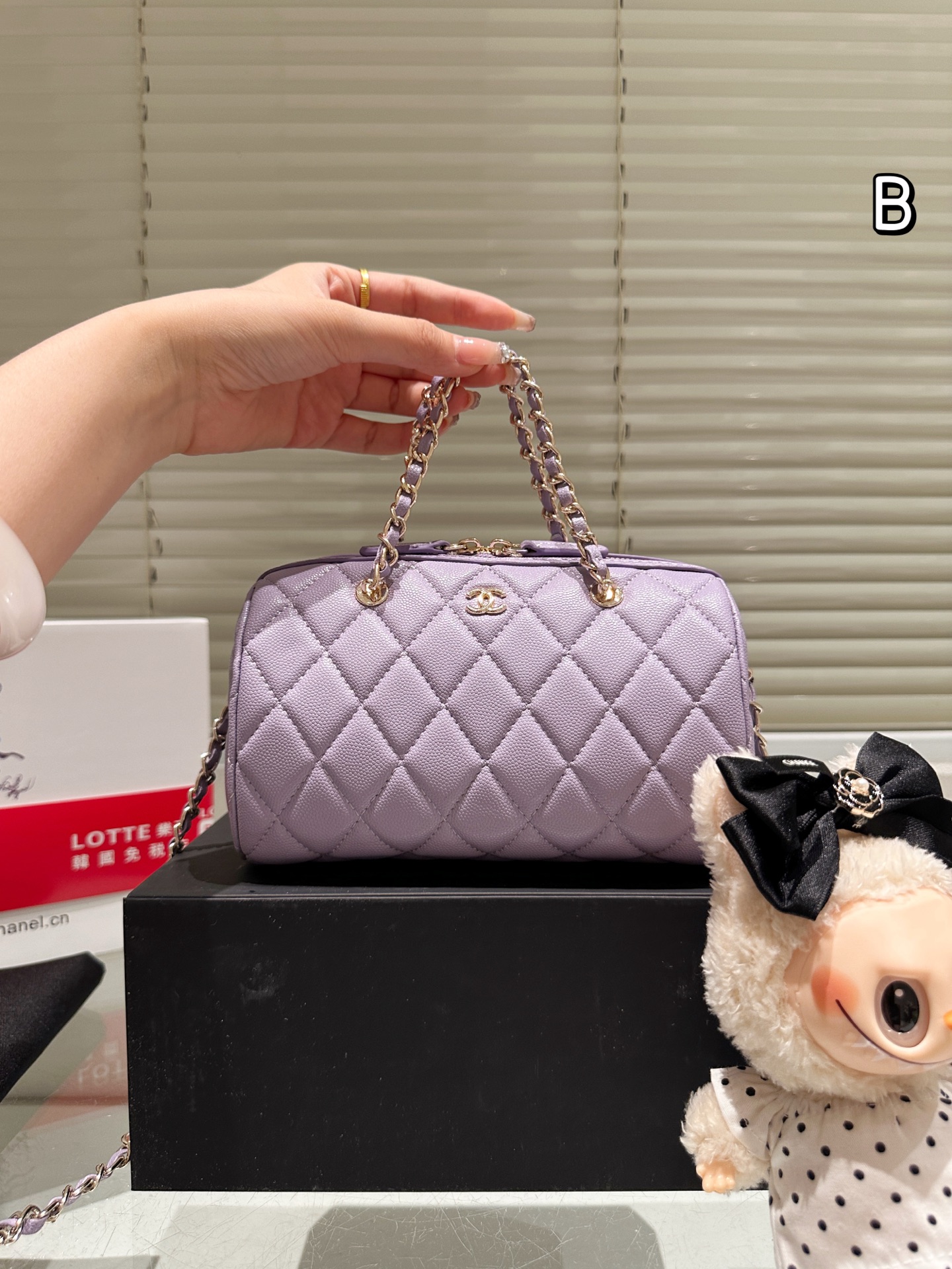 Chanel 25P bowling bag