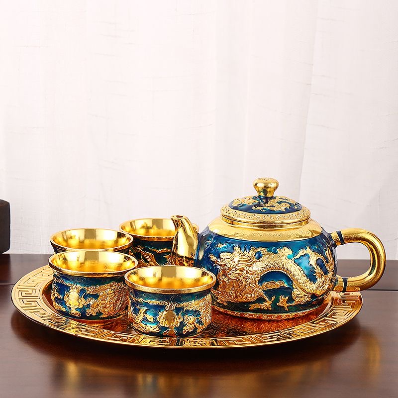 A six-piece set of blue and gold gilded tea set