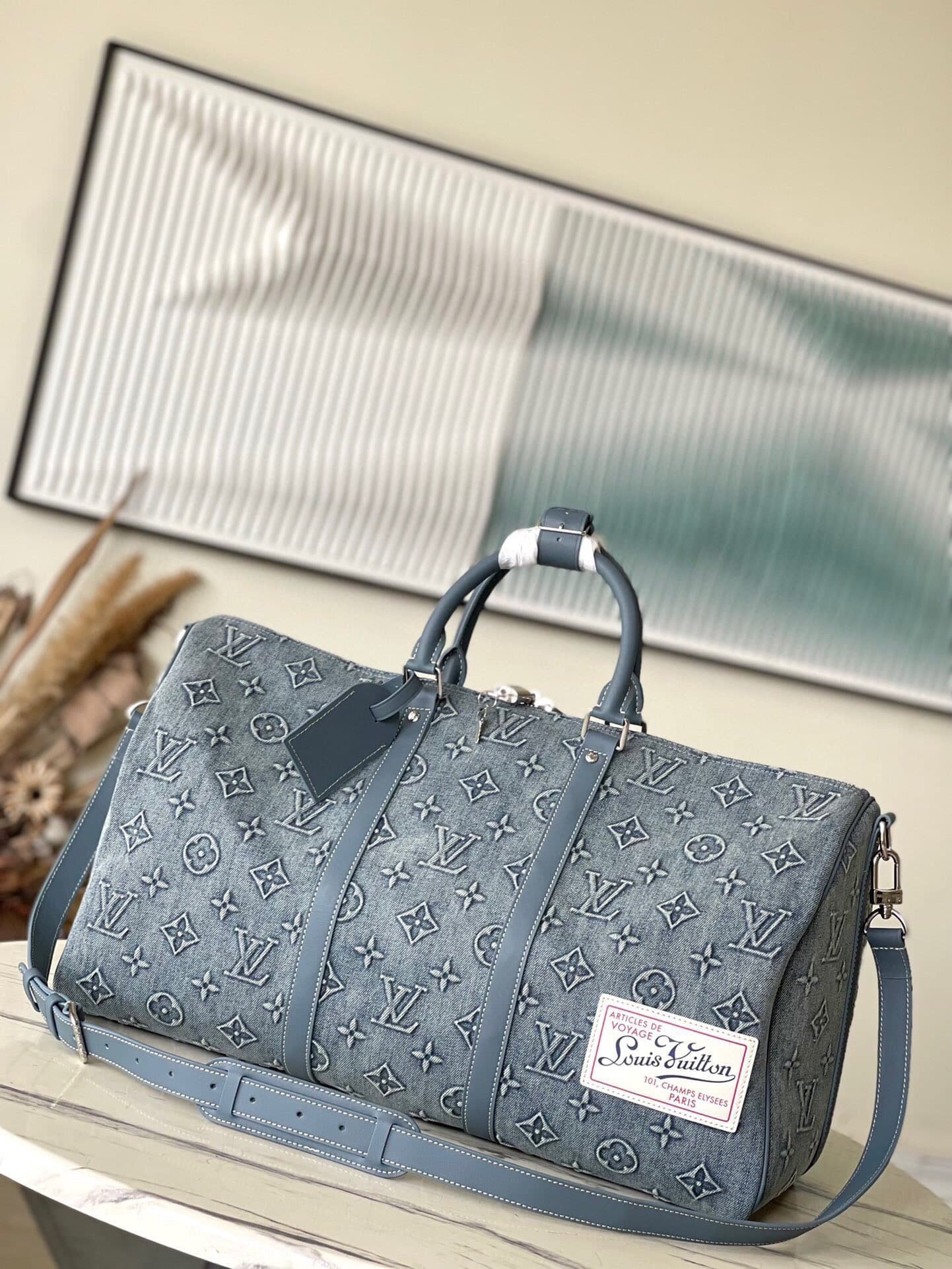 LV Keepall Bandouli��re 50