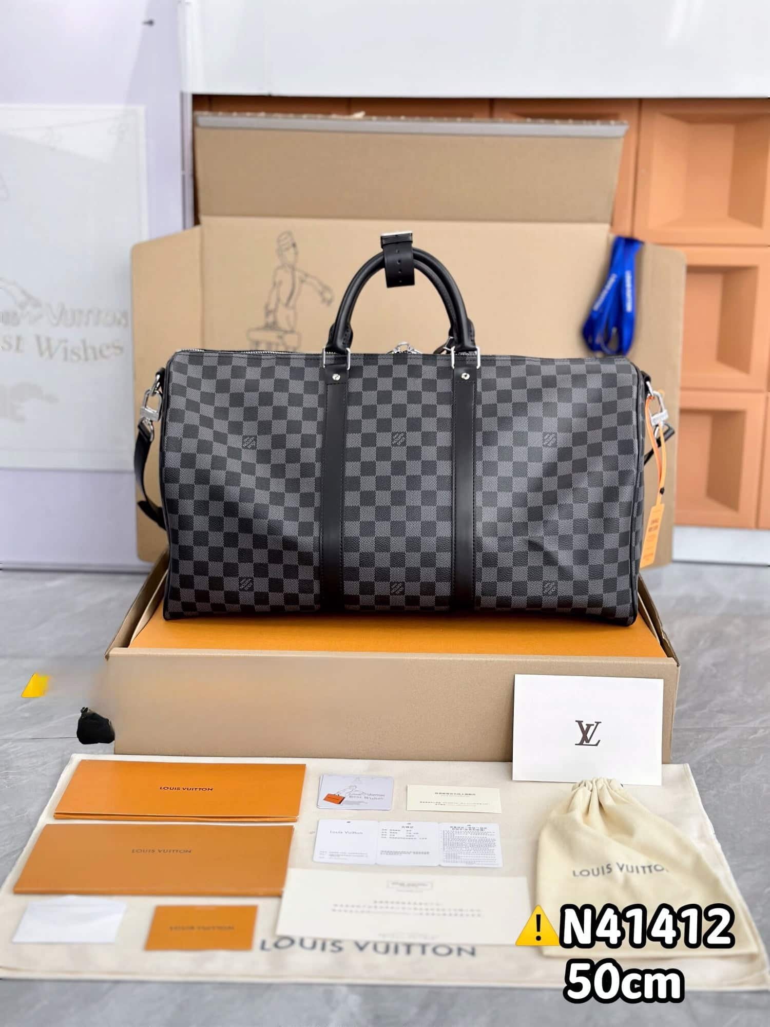 LV Keepall Bandouli��re 50