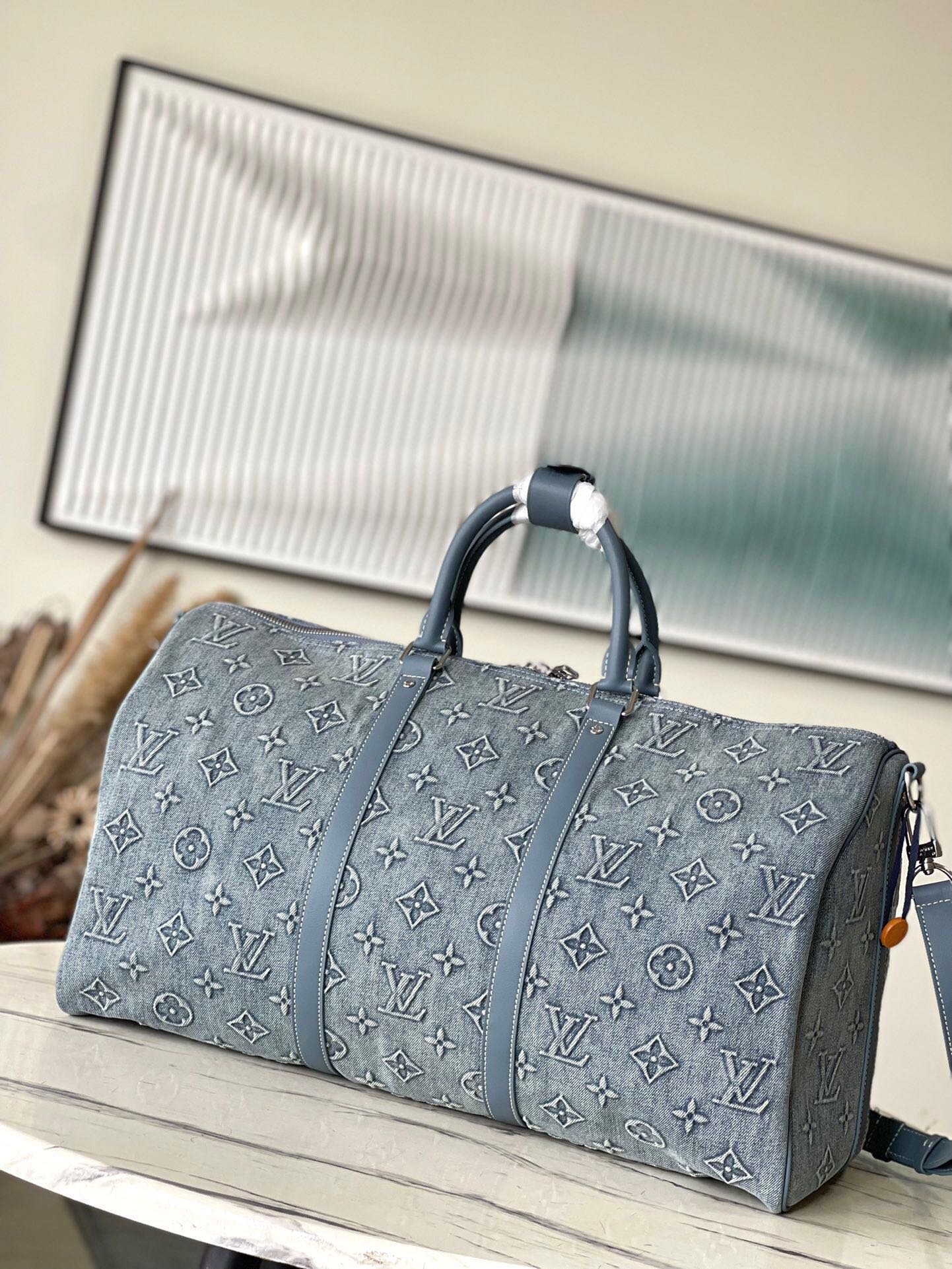 LV Keepall Bandouli��re 50