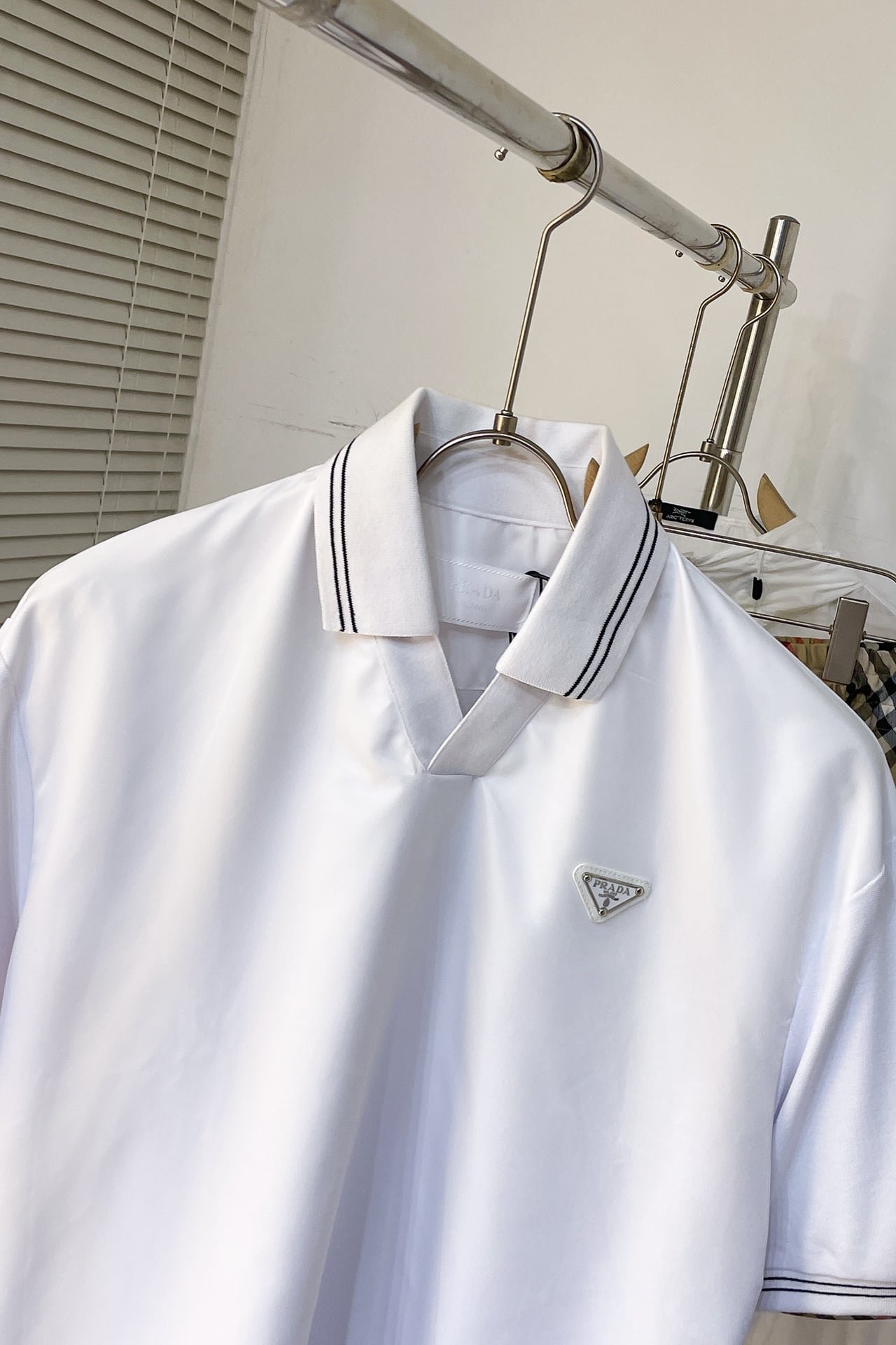 Prada Piqué polo shirt with Re-Nylon detail