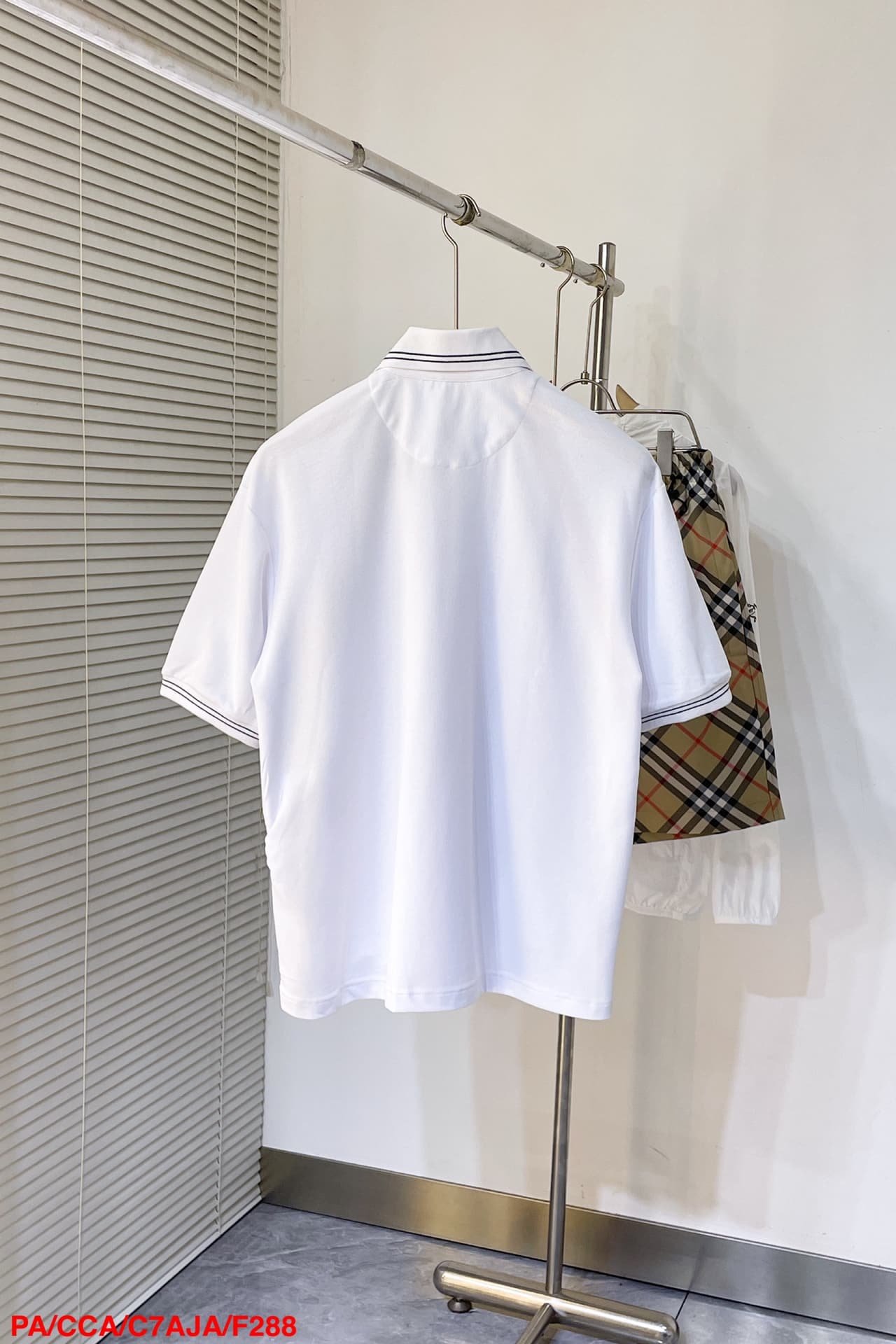 Prada Piqué polo shirt with Re-Nylon detail