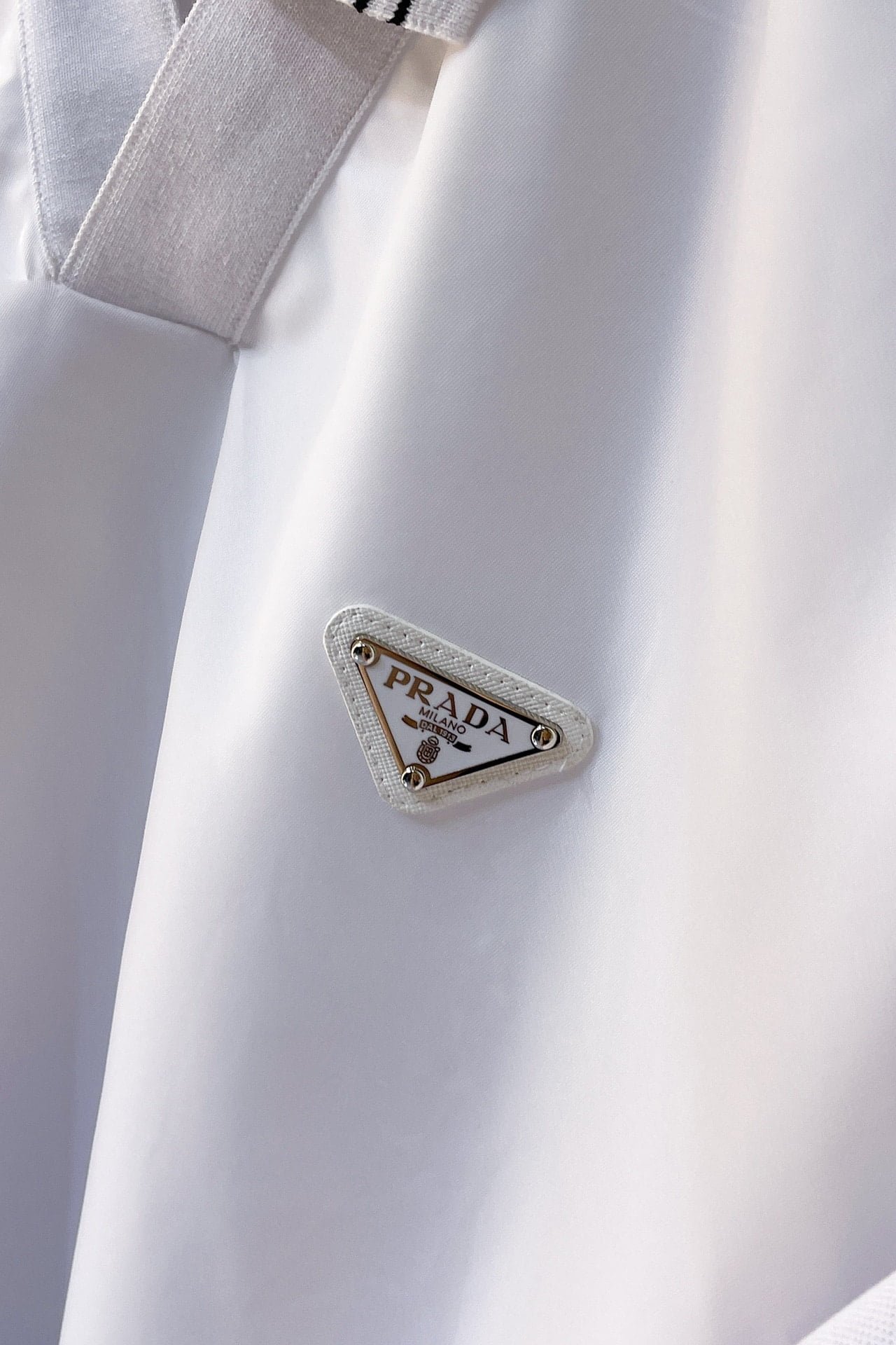 Prada Piqué polo shirt with Re-Nylon detail