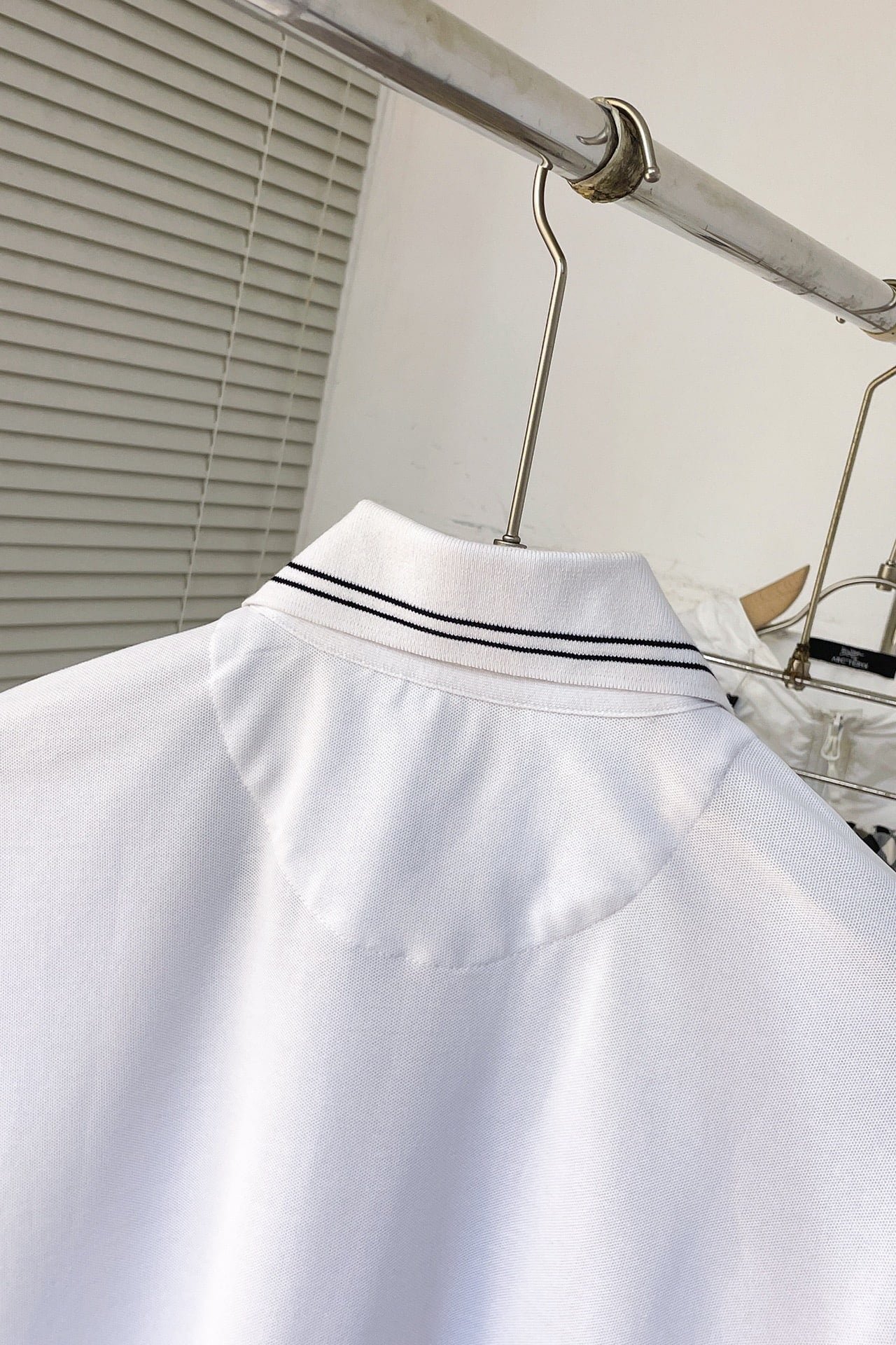 Prada Piqué polo shirt with Re-Nylon detail