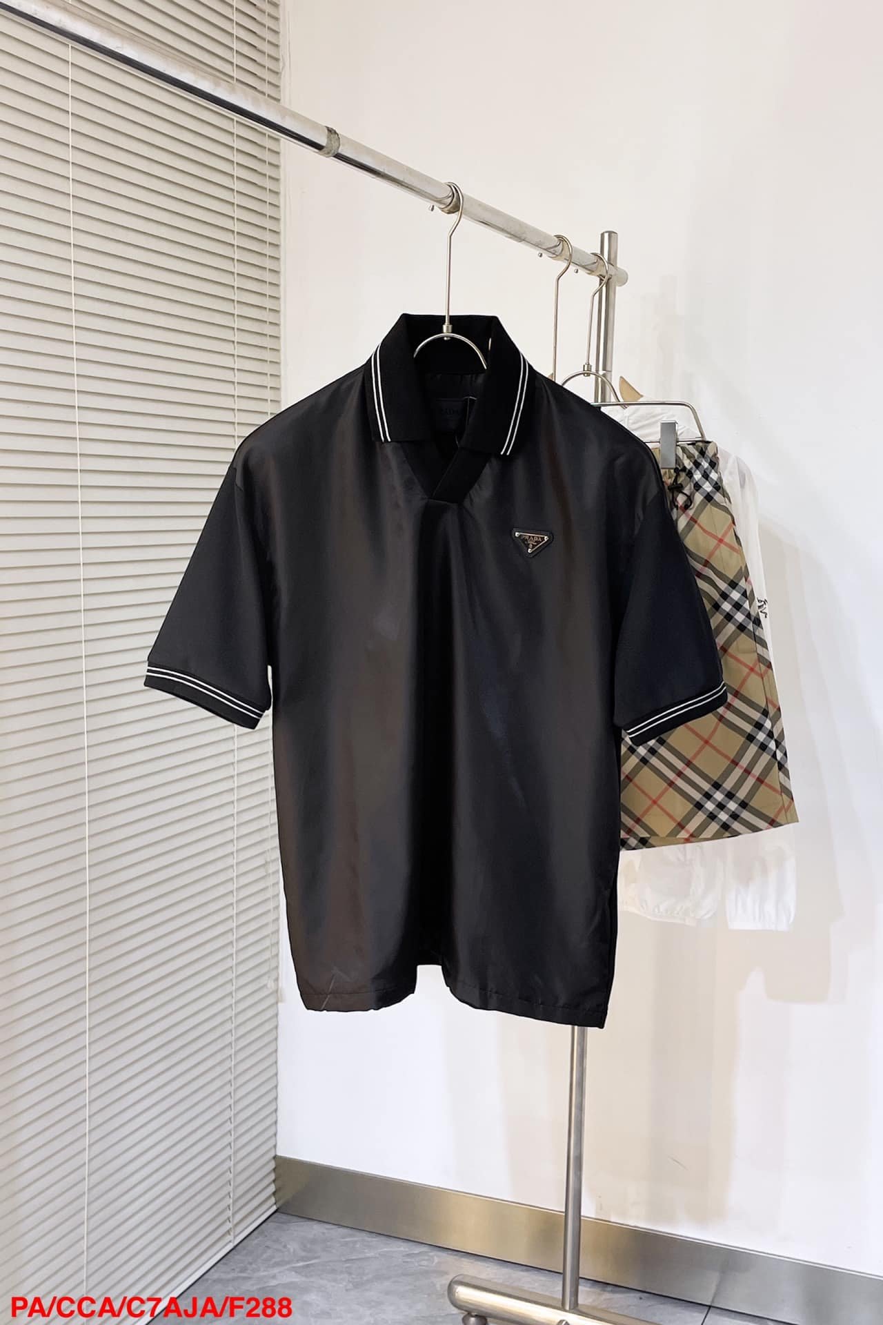 Prada Piqué polo shirt with Re-Nylon detail