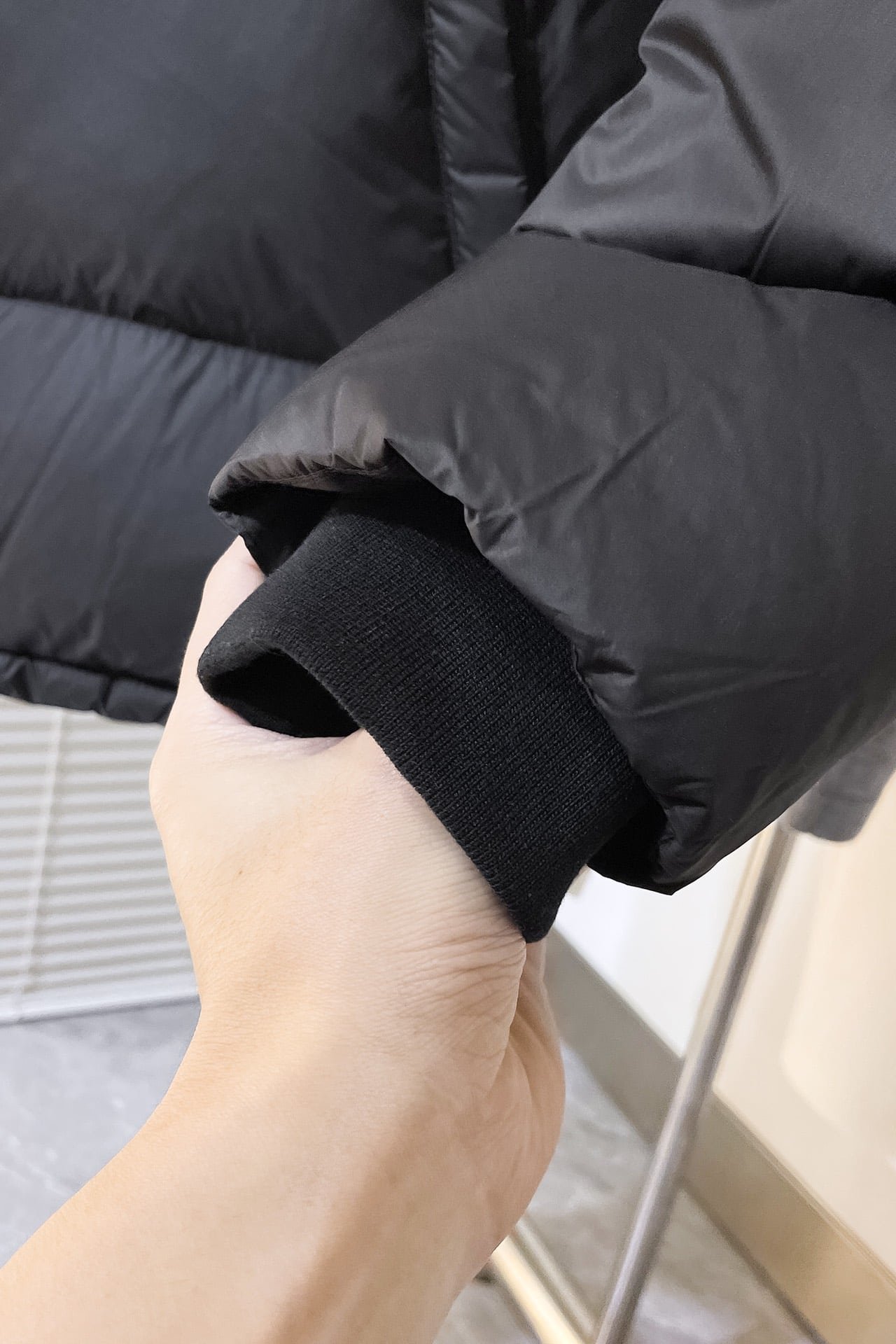Down-filled garment
