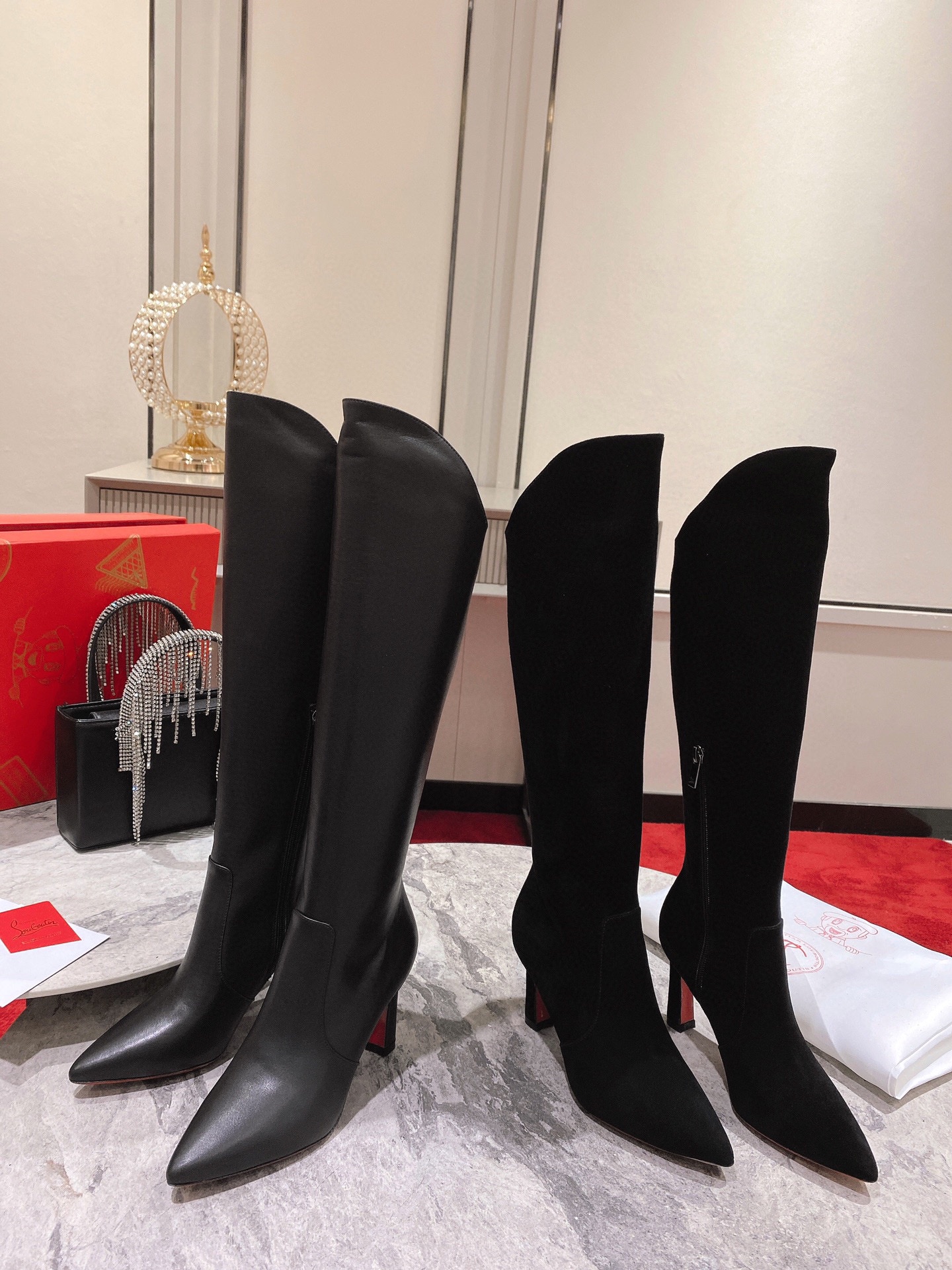 Christian Louboutin red-soled shoes The classic long boots