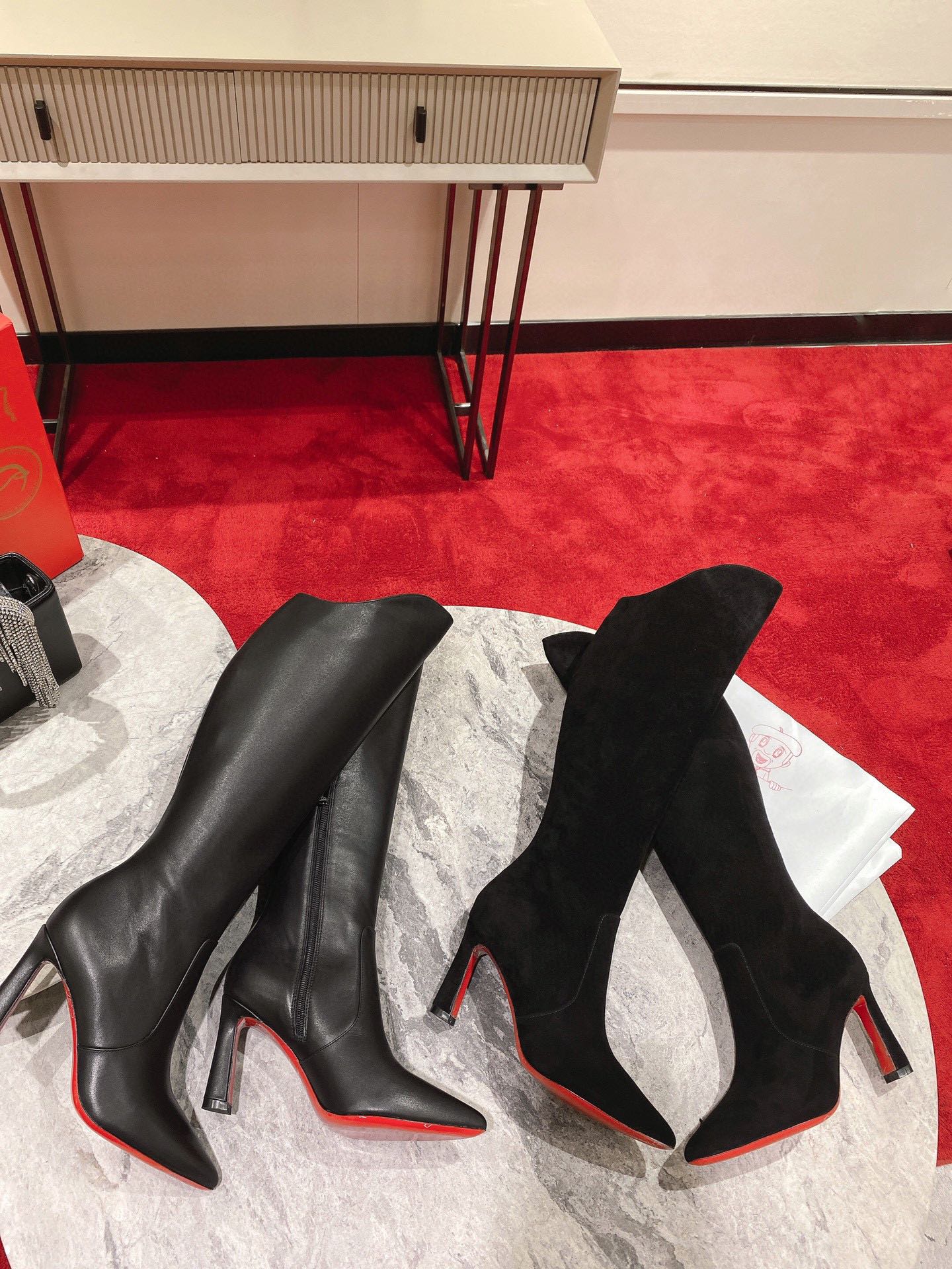 Christian Louboutin red-soled shoes The classic long boots